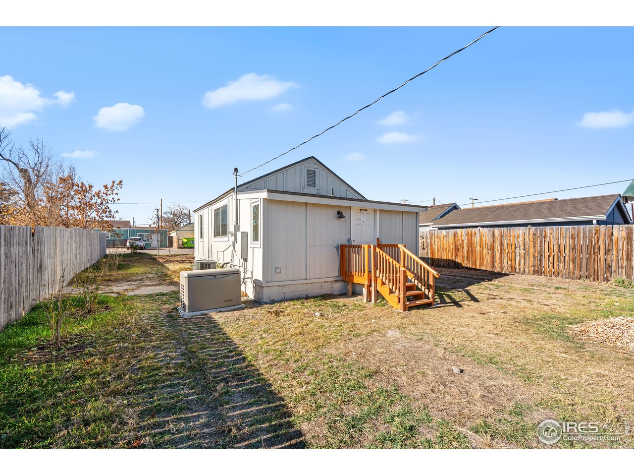 2706 7th Avenue Garden City, CO 80631 - Photo 33 of 47 a view of a house with backyard