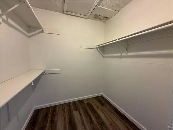 a view of a room with racks on the wall