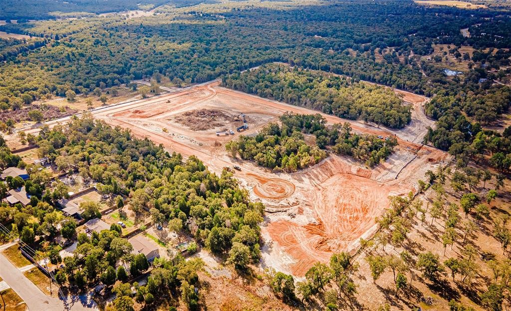 123 Los Robles Road Elgin, TX 78621 - Photo 1 of 1 a view of a backyard of a house