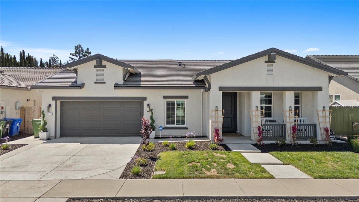 3715 North Berkeley Avenue Turlock, CA 95382 - Photo 1 of 1 front view of a house