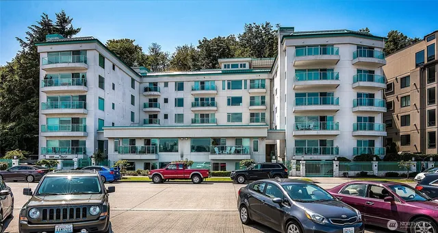 a cars parked in front of a building