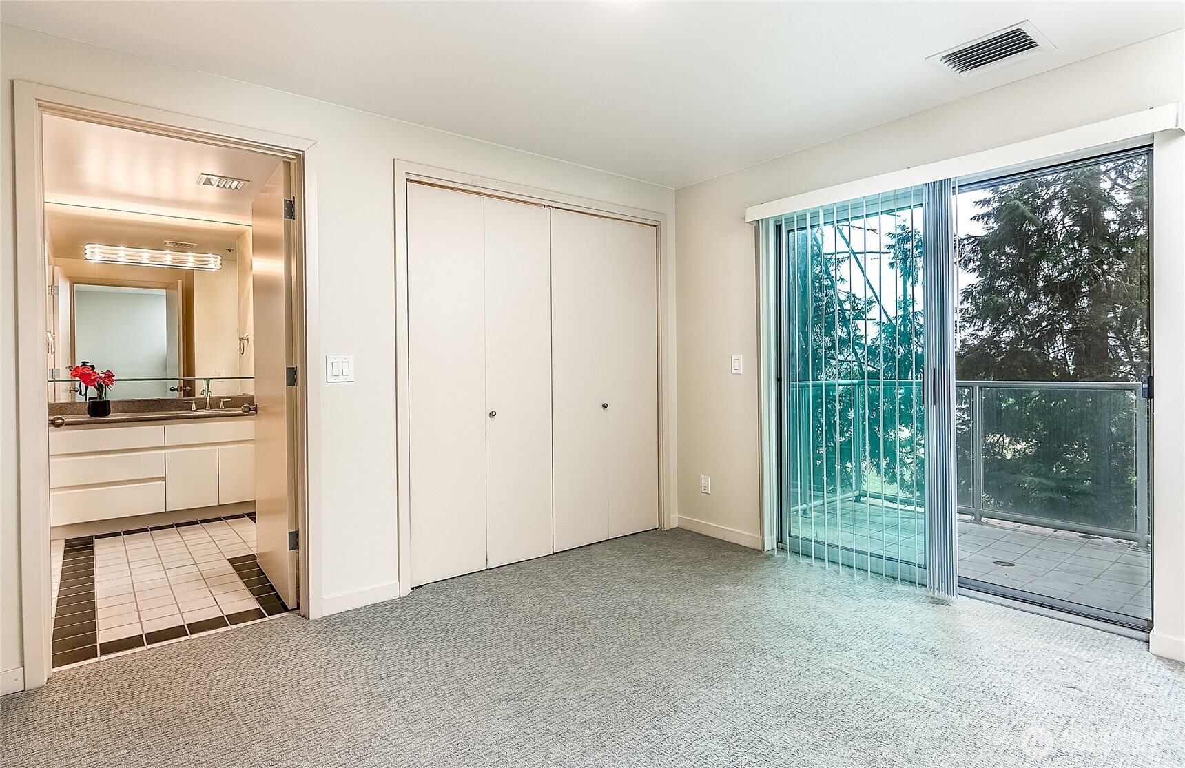 1027 Harbor Avenue Southwest, Unit 303 Seattle, WA 98116 - Photo 17 of 20 a view of an empty room with a window