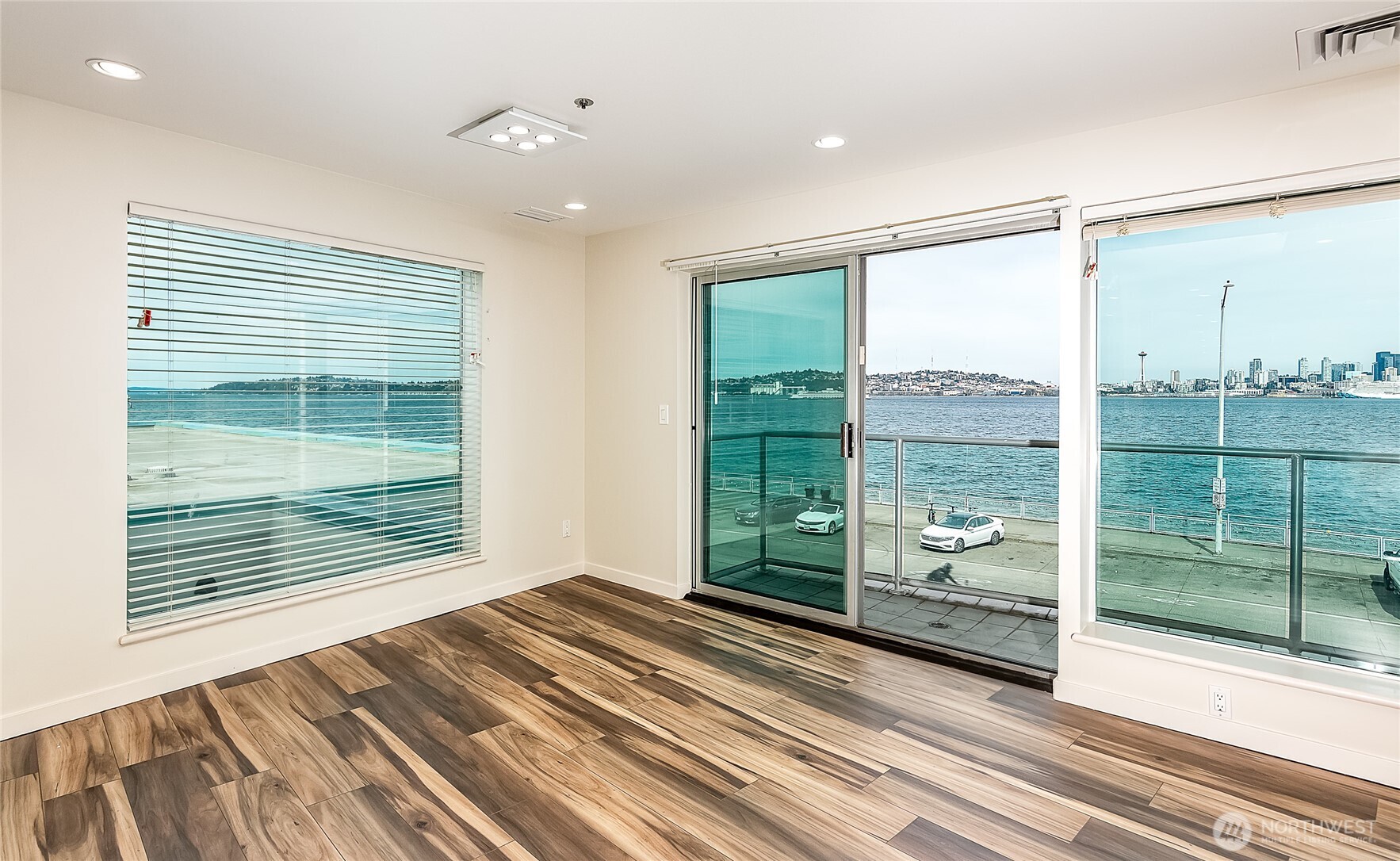 1027 Harbor Avenue Southwest, Unit 303 Seattle, WA 98116 - Photo 9 of 20 a view of a room that has a large window