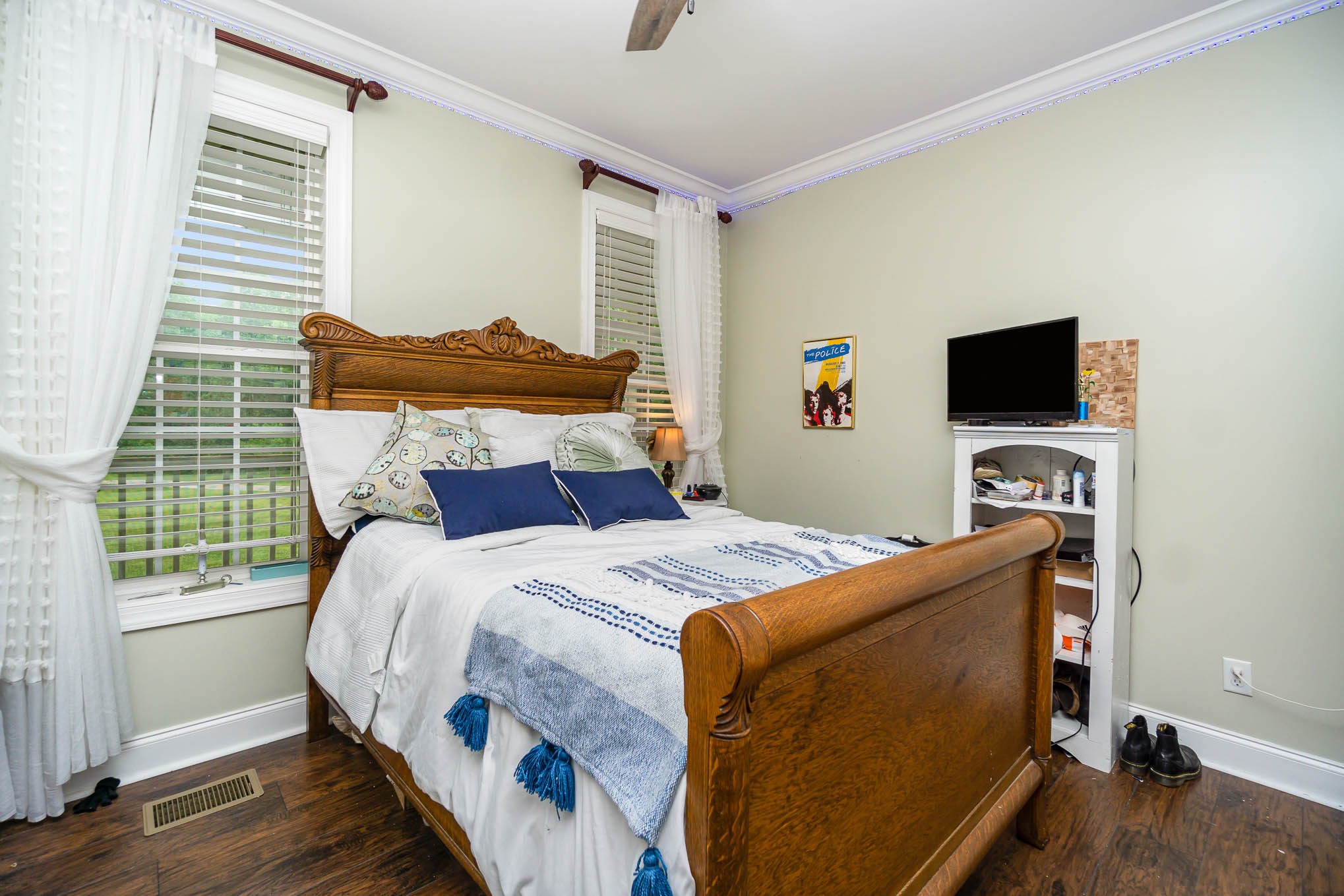 7881 Pinewood Road Fairview, TN 37062 - Photo 20 of 40 a bedroom with a bed and tv