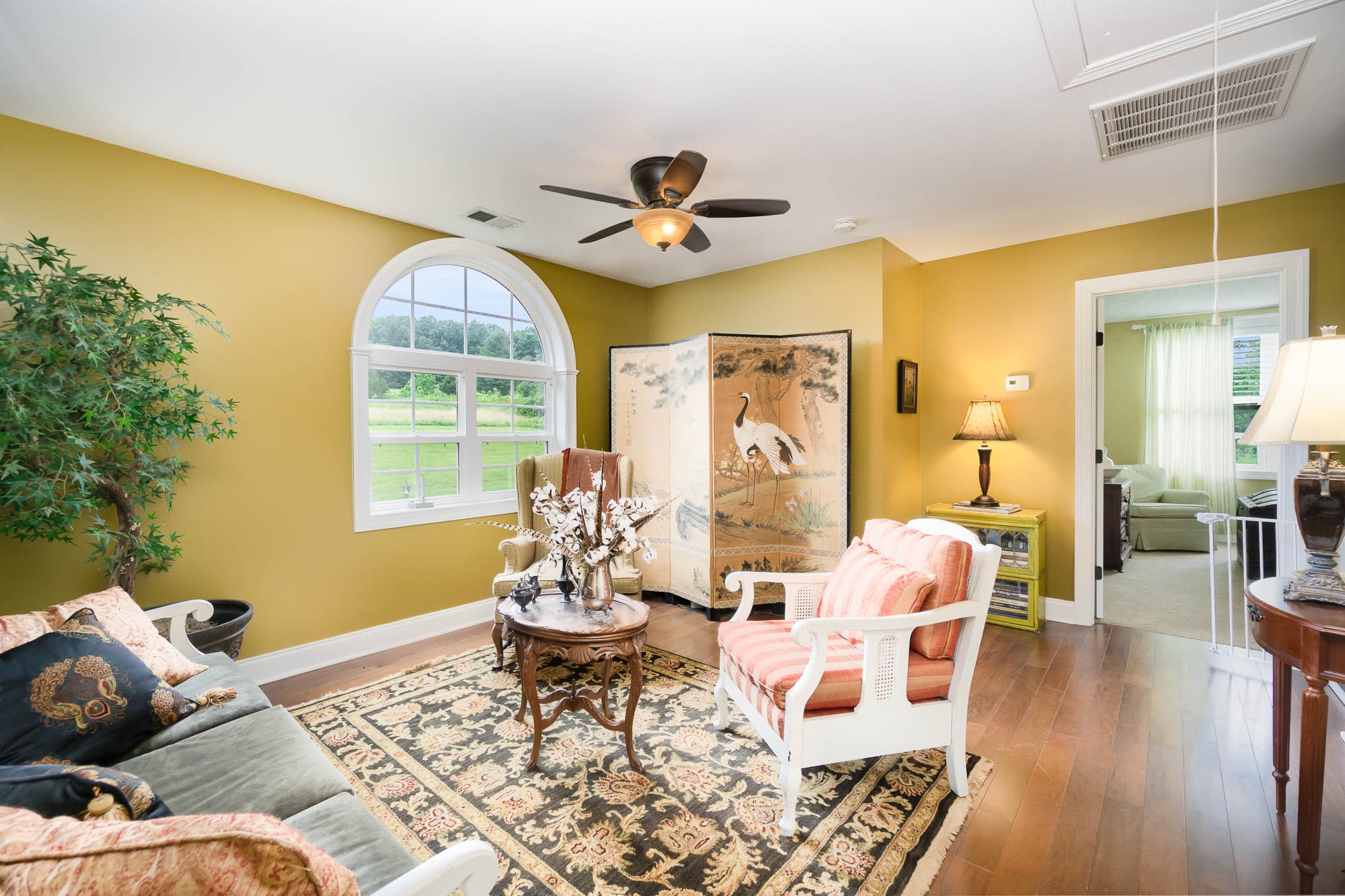 7881 Pinewood Road Fairview, TN 37062 - Photo 25 of 40 a living room with furniture and wooden floor