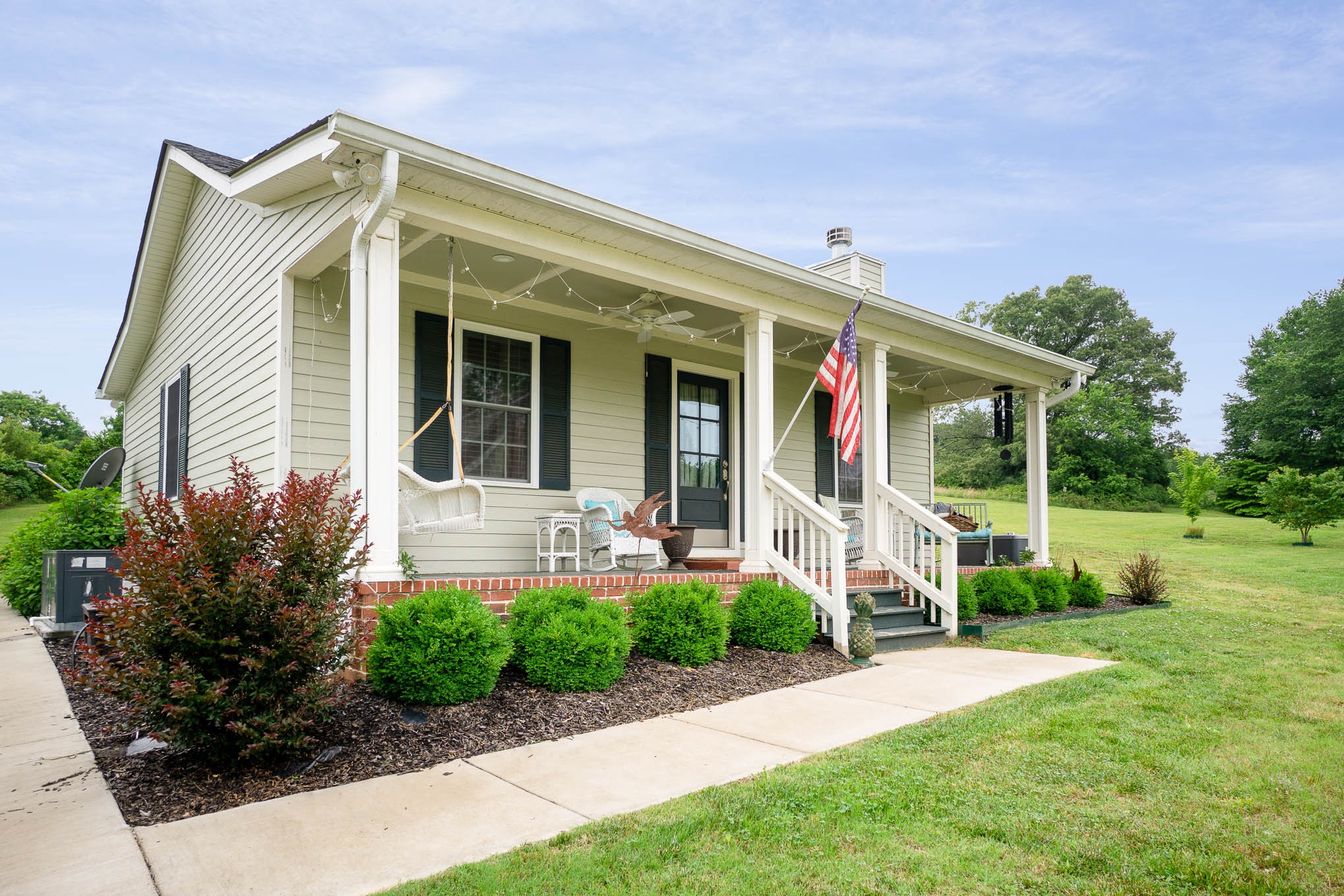7881 Pinewood Road Fairview, TN 37062 - Photo 3 of 40 a front view of a house with garden