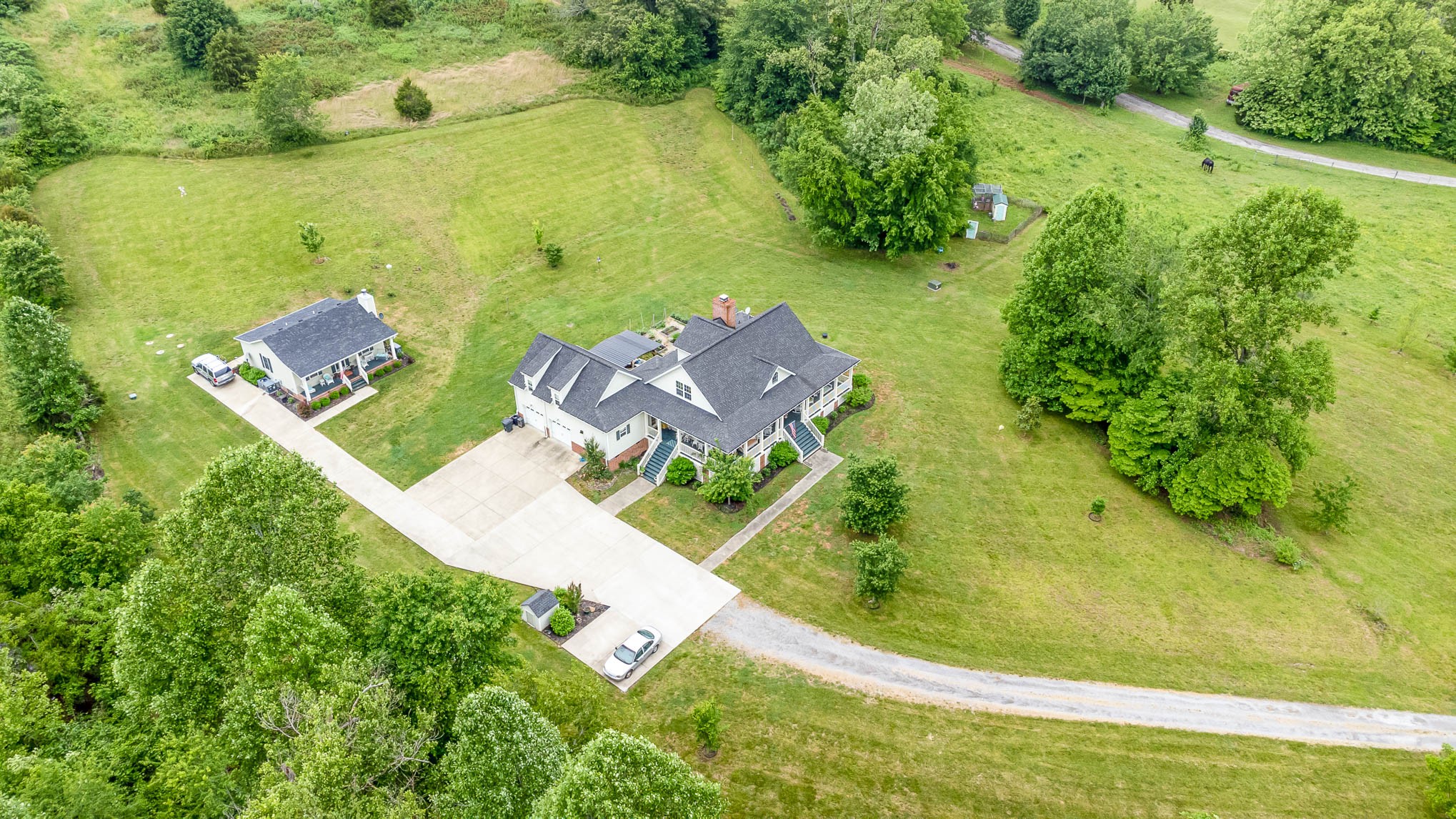 7881 Pinewood Road Fairview, TN 37062 - Photo 32 of 40 an aerial view of a house with a yard and lake view