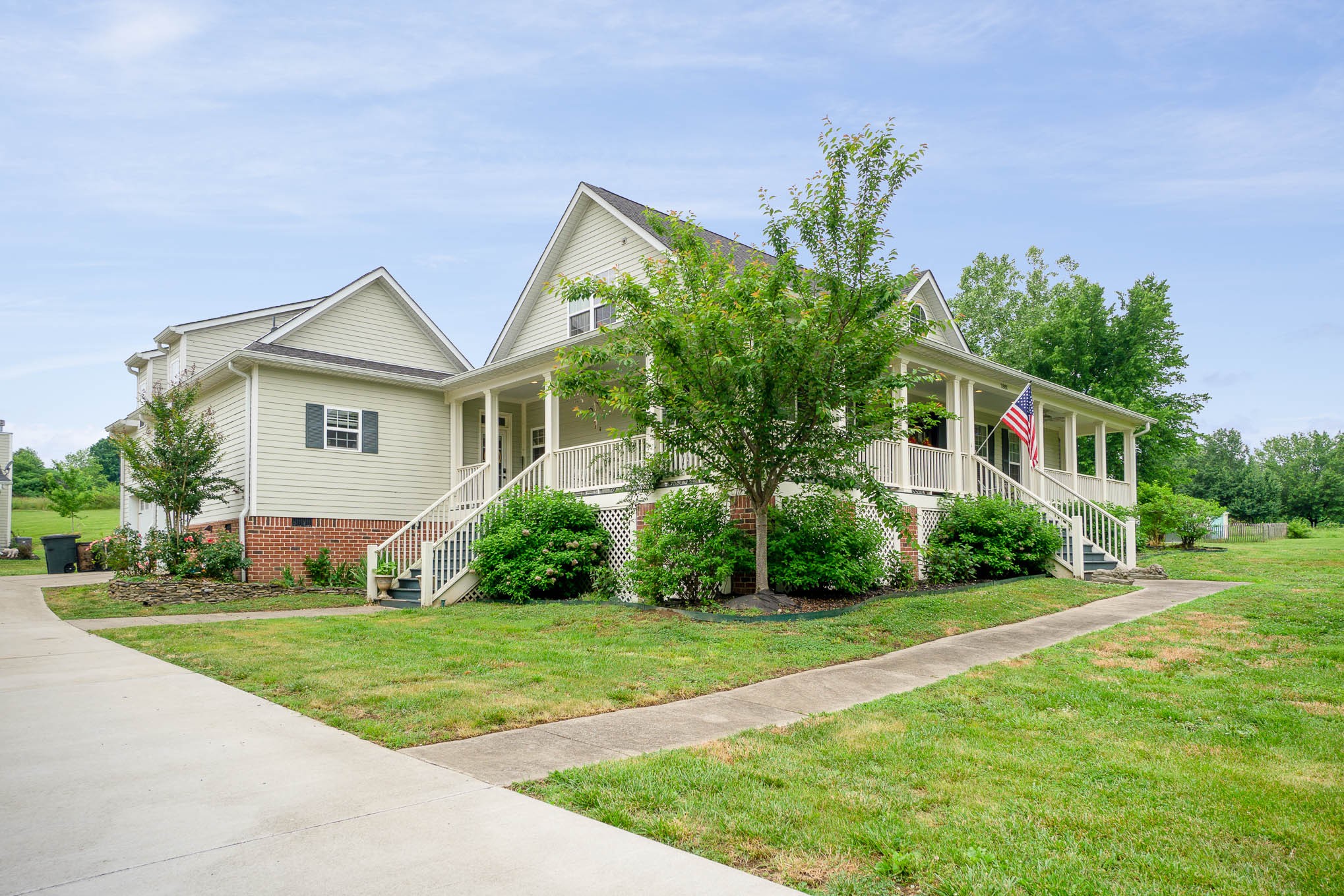 7881 Pinewood Road Fairview, TN 37062 - Photo 4 of 40 a front view of house with yard and green space