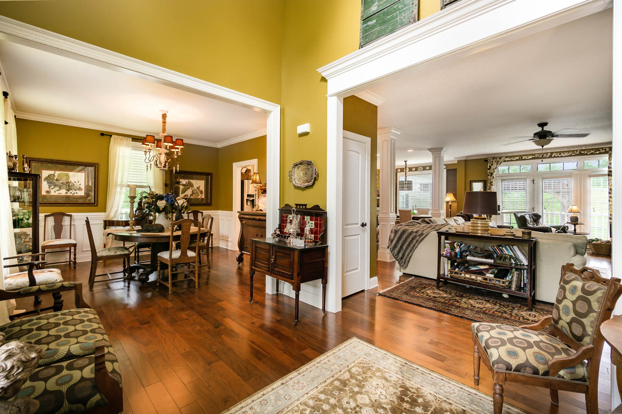 7881 Pinewood Road Fairview, TN 37062 - Photo 8 of 40 a living room with furniture dining table and wooden floor