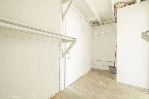 a view of a room with rack on the wall