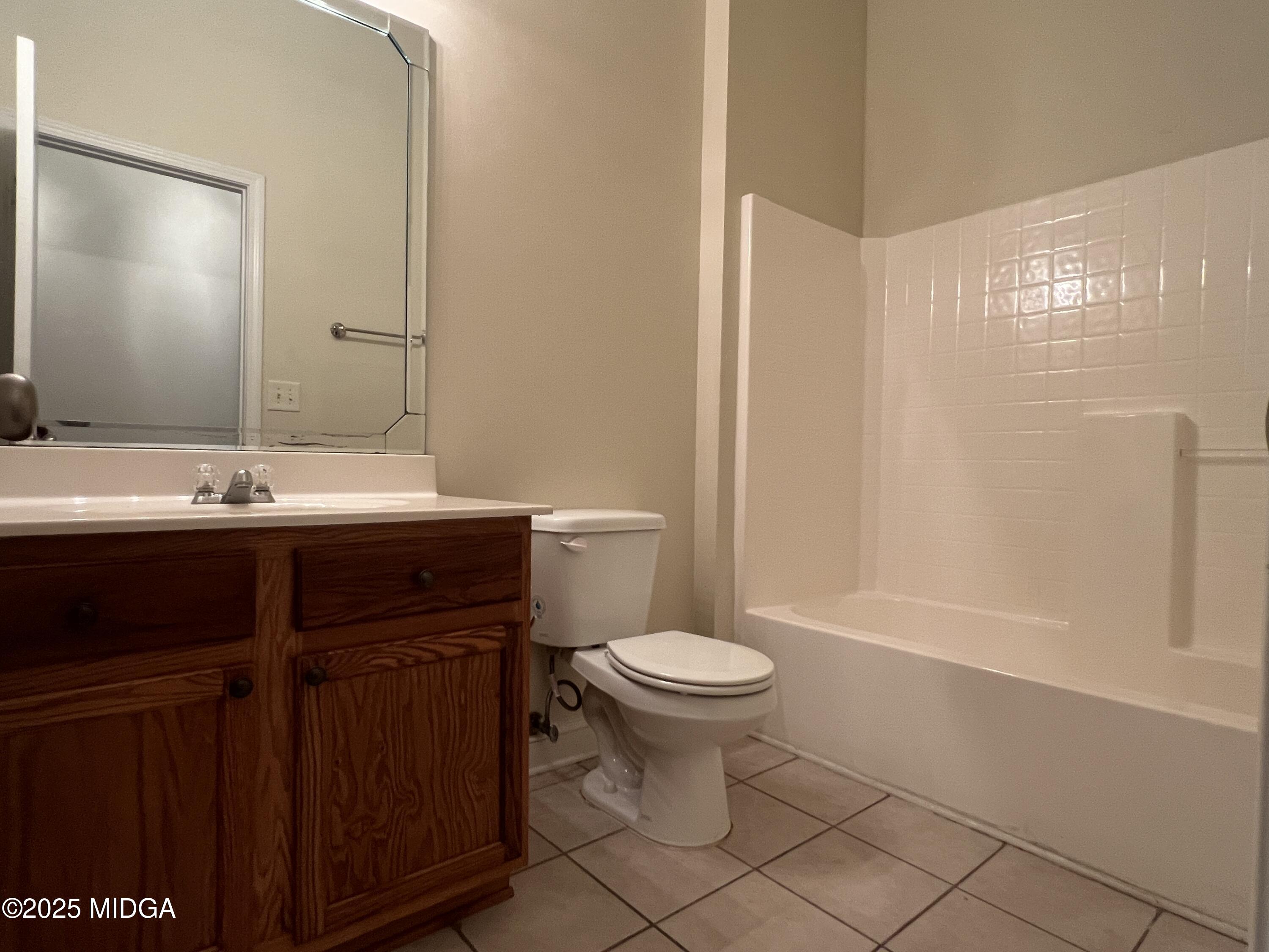 644 Ivy Brook Way Macon, GA 31210 - Photo 11 of 29 a bathroom with a sink toilet and shower