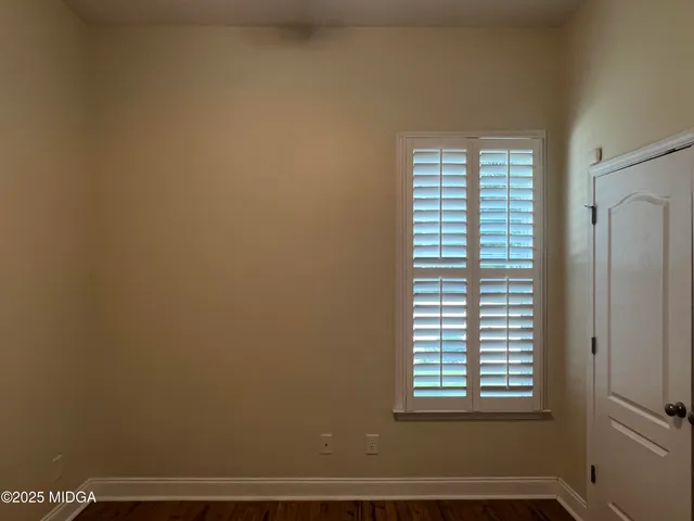 a view of a room that has a window in it