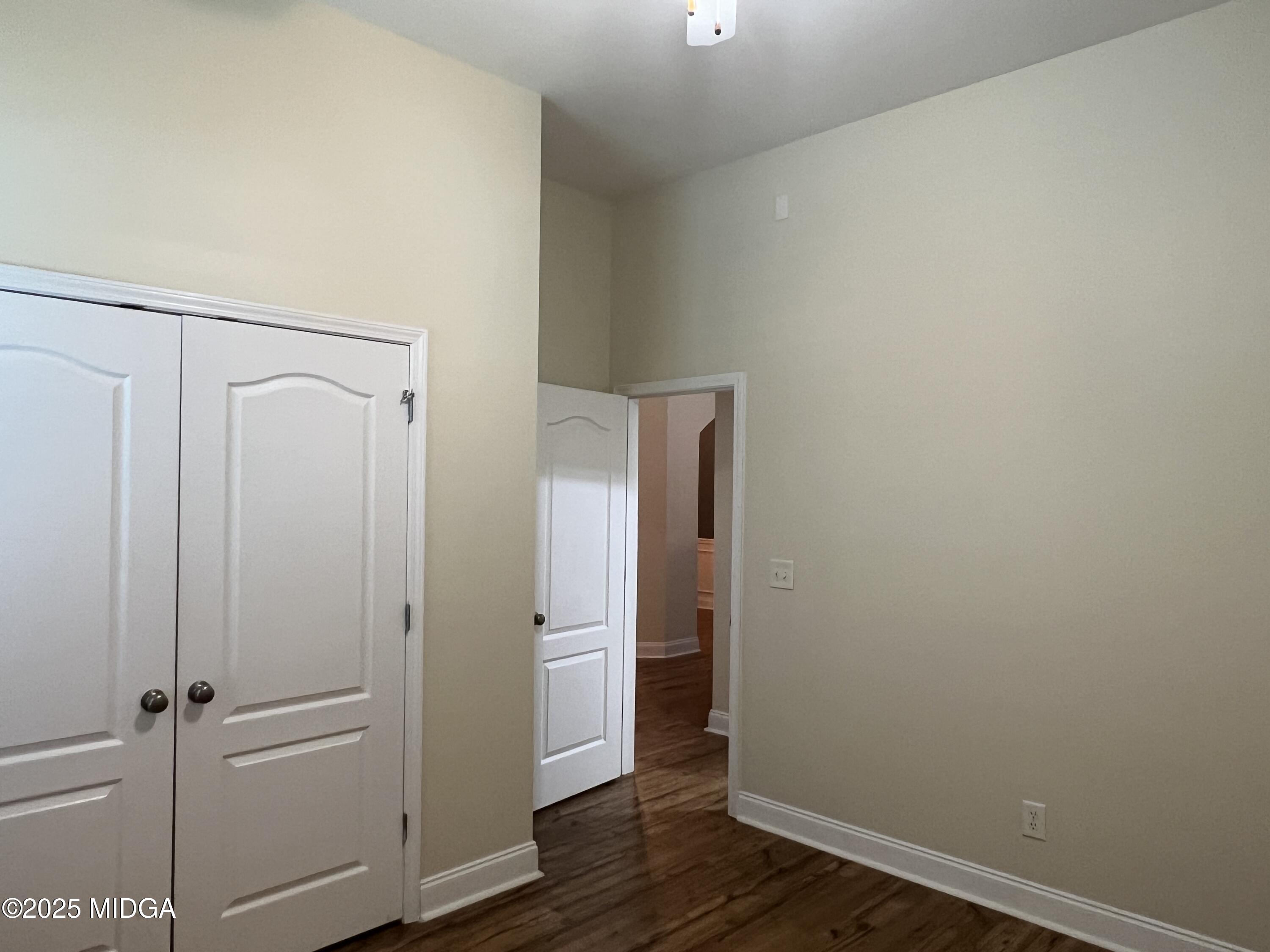 644 Ivy Brook Way Macon, GA 31210 - Photo 22 of 29 wooden floor in an empty room