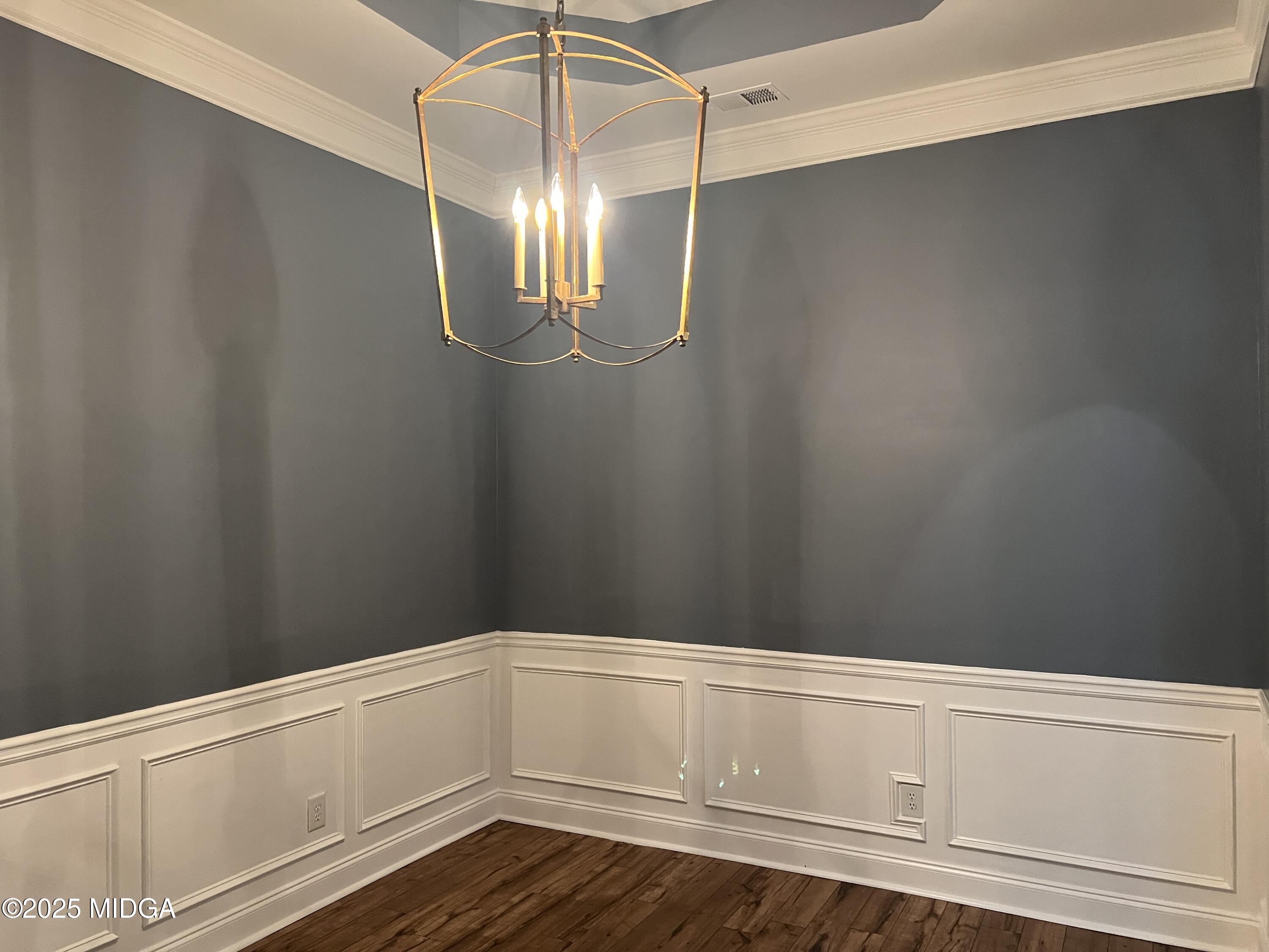 644 Ivy Brook Way Macon, GA 31210 - Photo 9 of 29 a view of an empty room with wooden floor