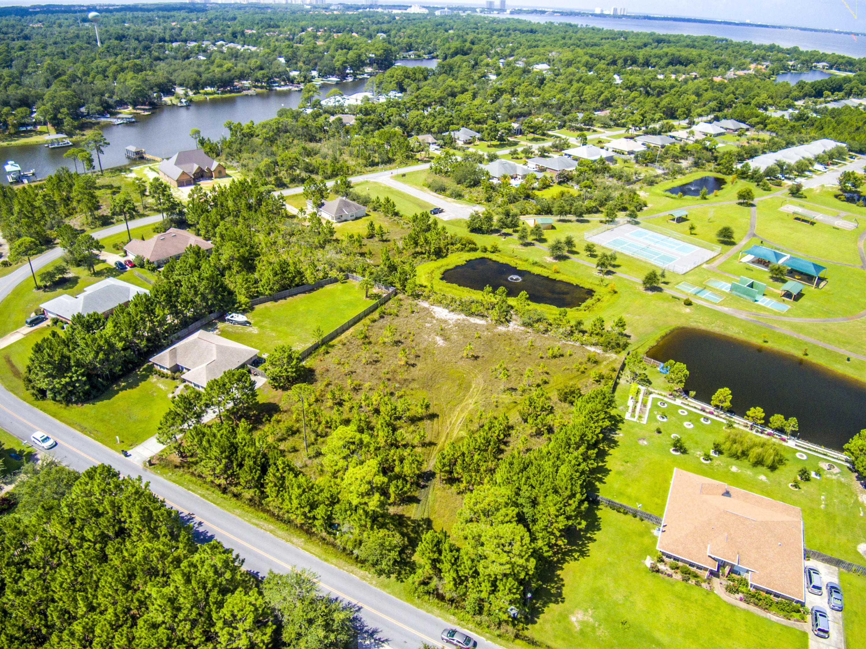 Lot 3 East Shipwreck Road Santa Rosa Beach, FL 32459 - Photo 17 of 26 a view of a yard with an umbrella