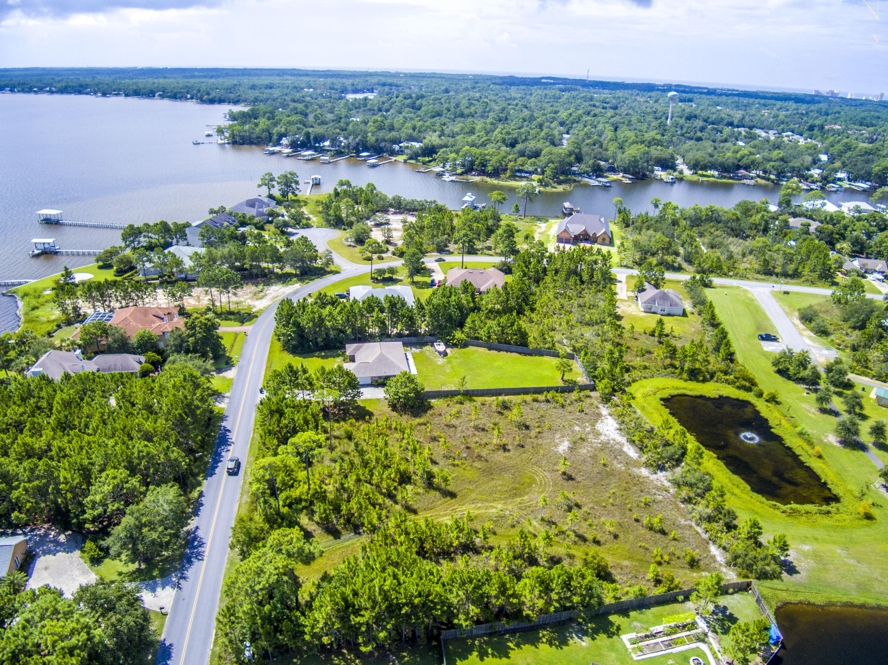 Lot 3 East Shipwreck Road Santa Rosa Beach, FL 32459 - Photo 18 of 26 a view of a lake with a city
