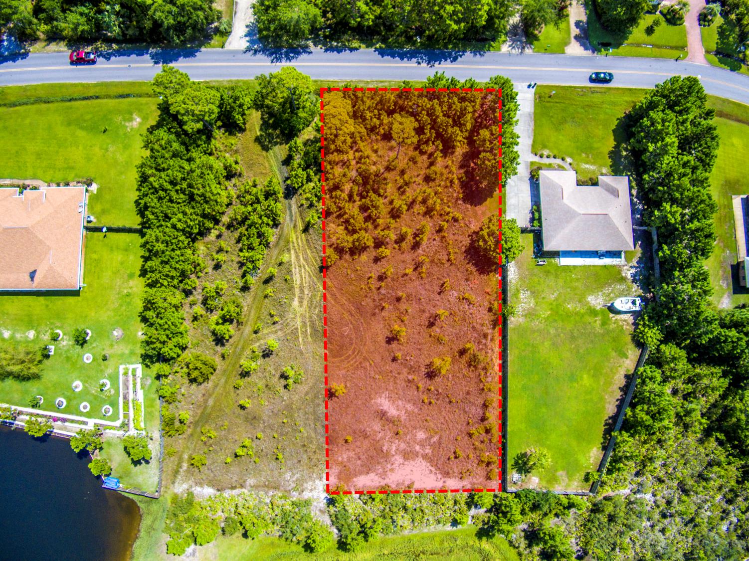 Lot 3 East Shipwreck Road Santa Rosa Beach, FL 32459 - Photo 3 of 26 a view of a yard with plants