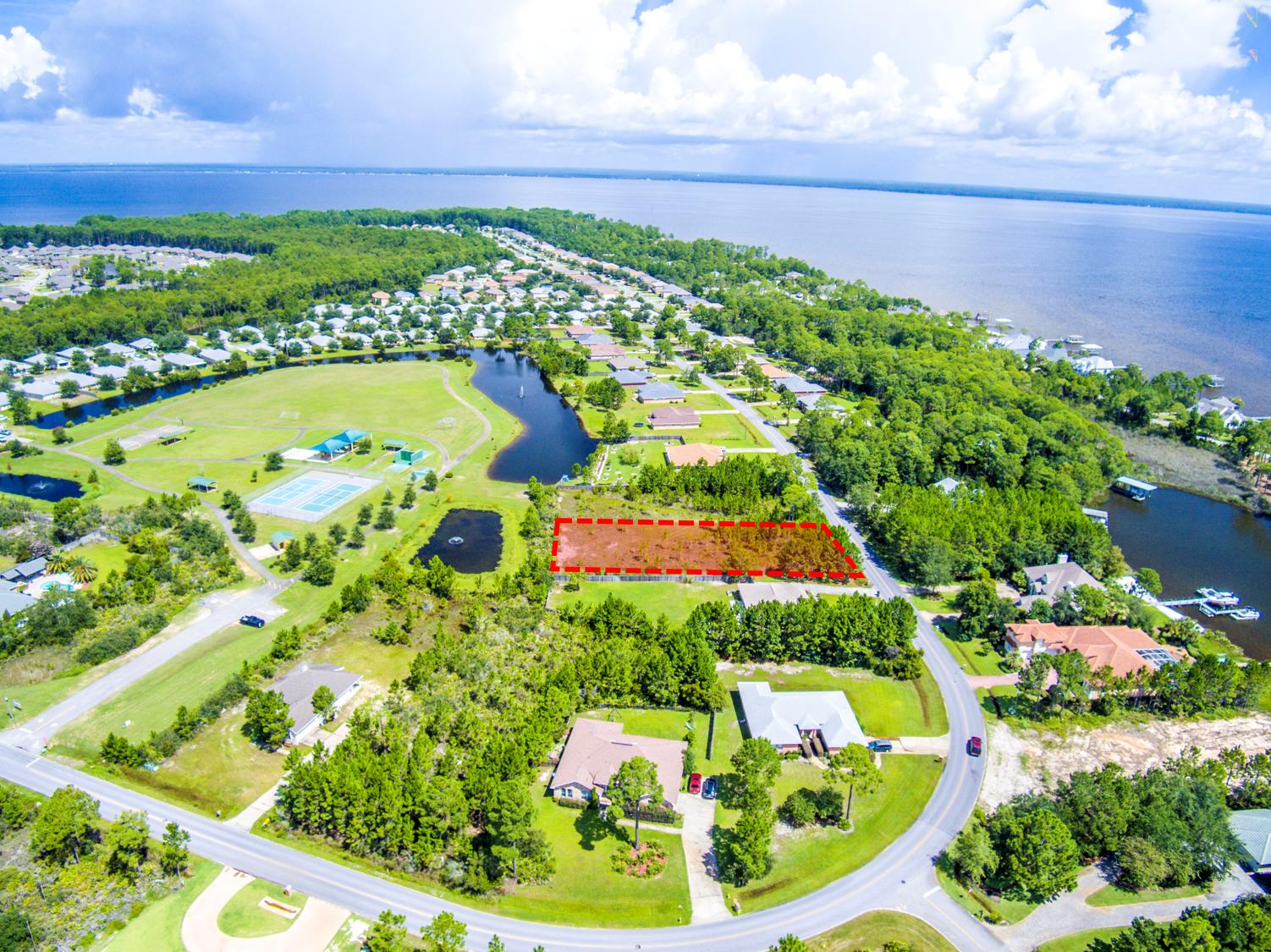 Lot 3 East Shipwreck Road Santa Rosa Beach, FL 32459 - Photo 6 of 26 a view of a swimming pool with a yard