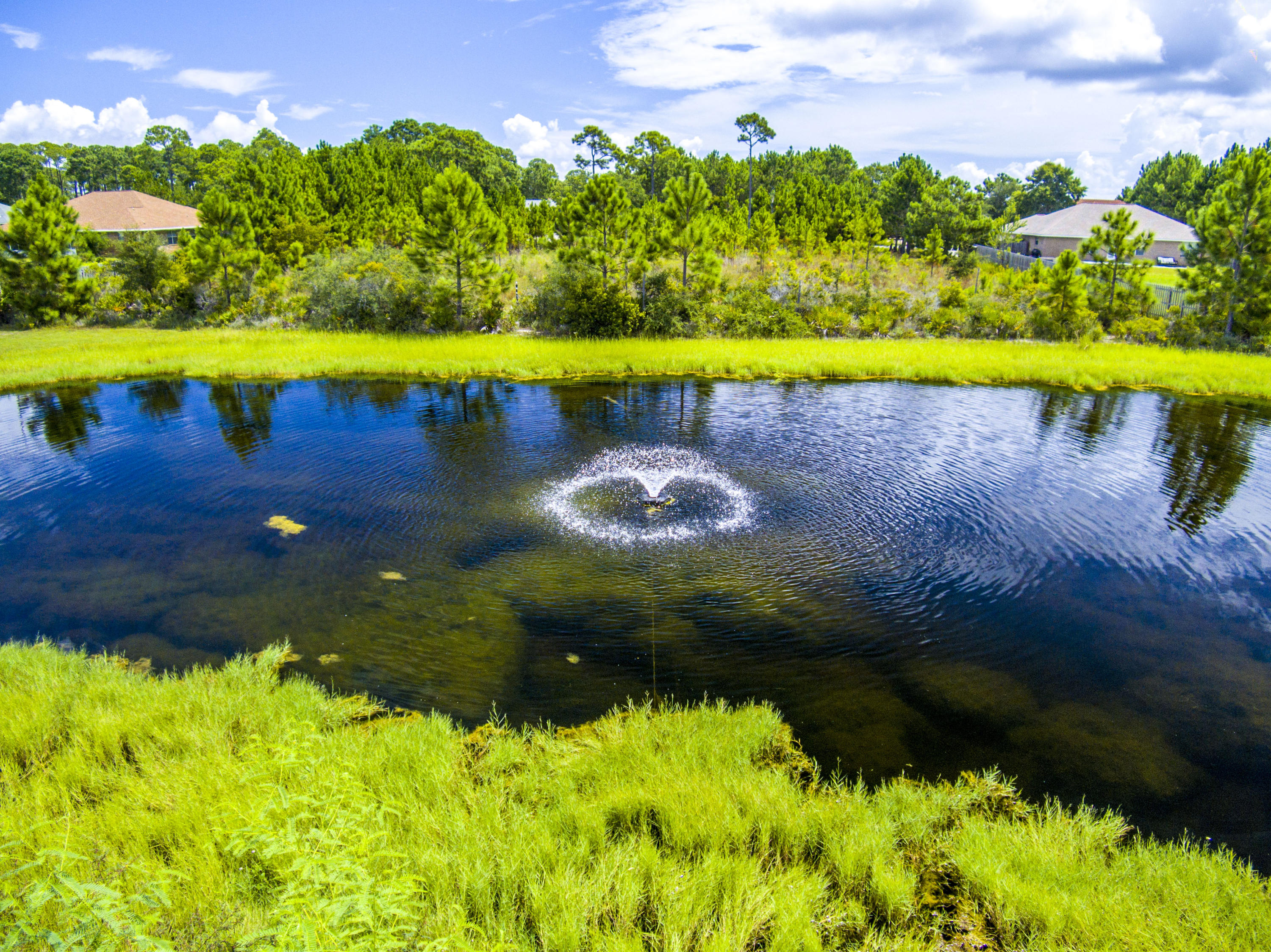 Lot 3 East Shipwreck Road Santa Rosa Beach, FL 32459 - Photo 9 of 26 a view of swimming pool with a yard and outdoor seating