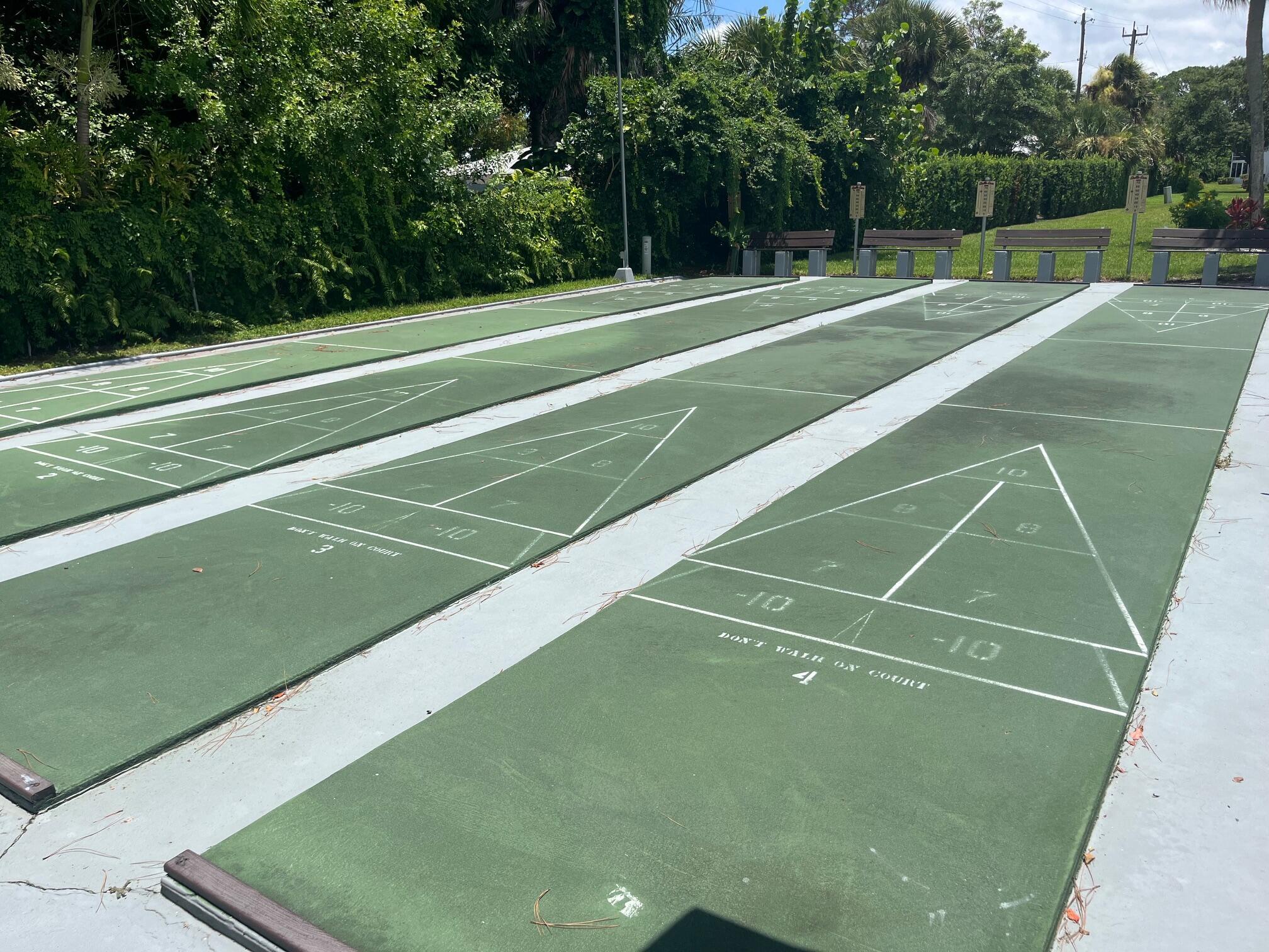 2950 Southeast Ocean Boulevard, Unit 75 Stuart, FL 34996 - Photo 18 of 19 a view of a tennis court