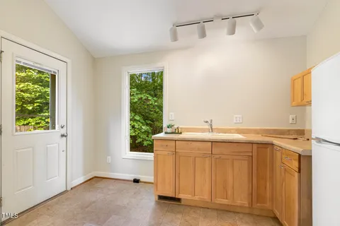 a view of a patio with swimming pool
