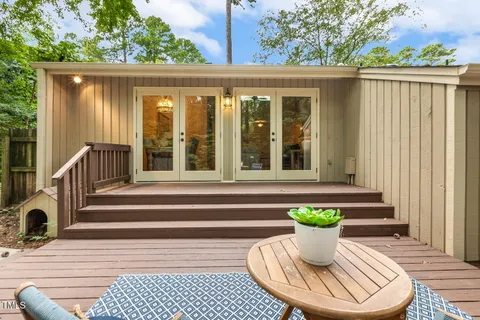 a view of a park with large trees