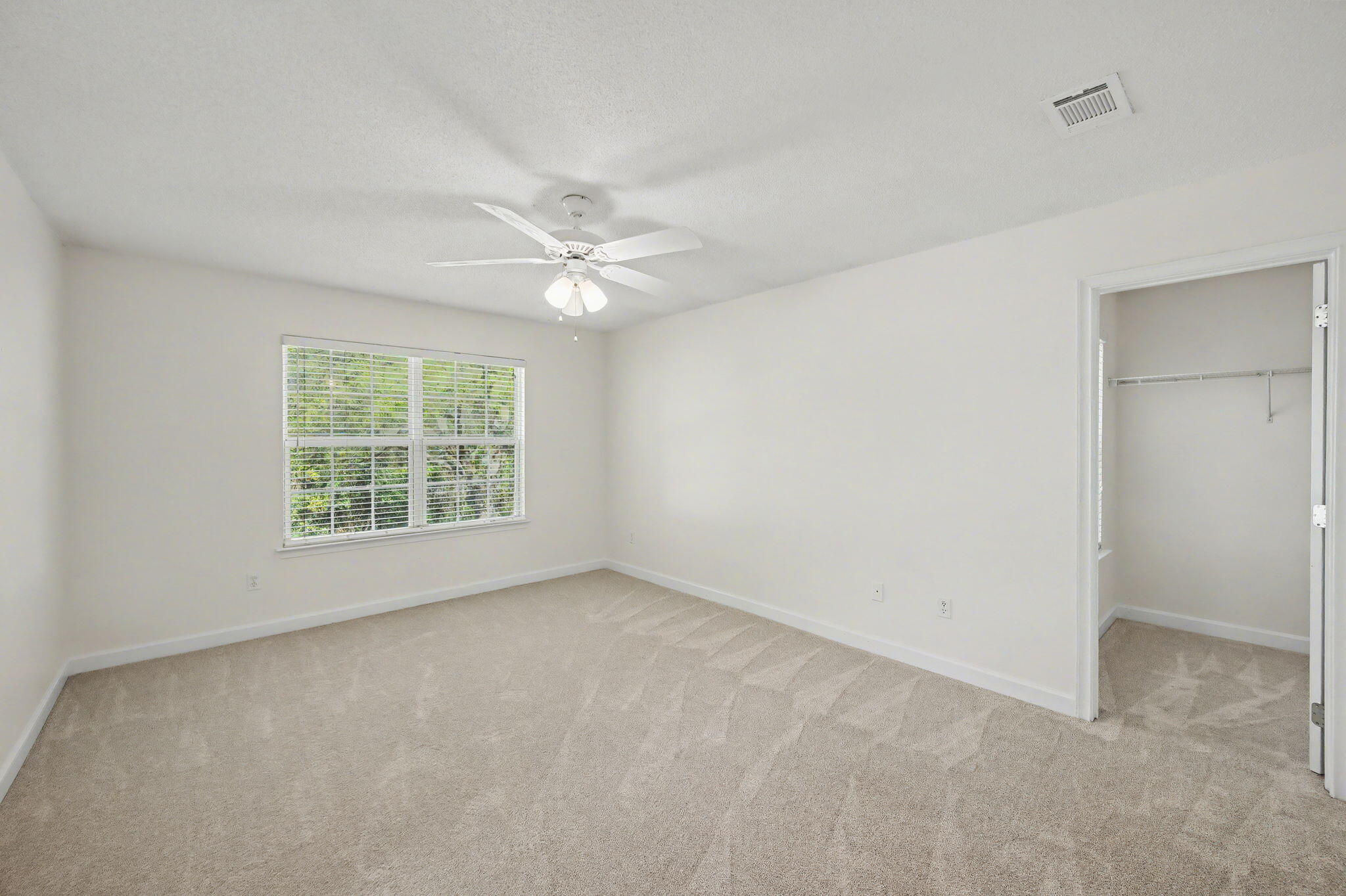 28 3rd Street Shalimar, FL 32579 - Photo 17 of 31 an empty room with a window