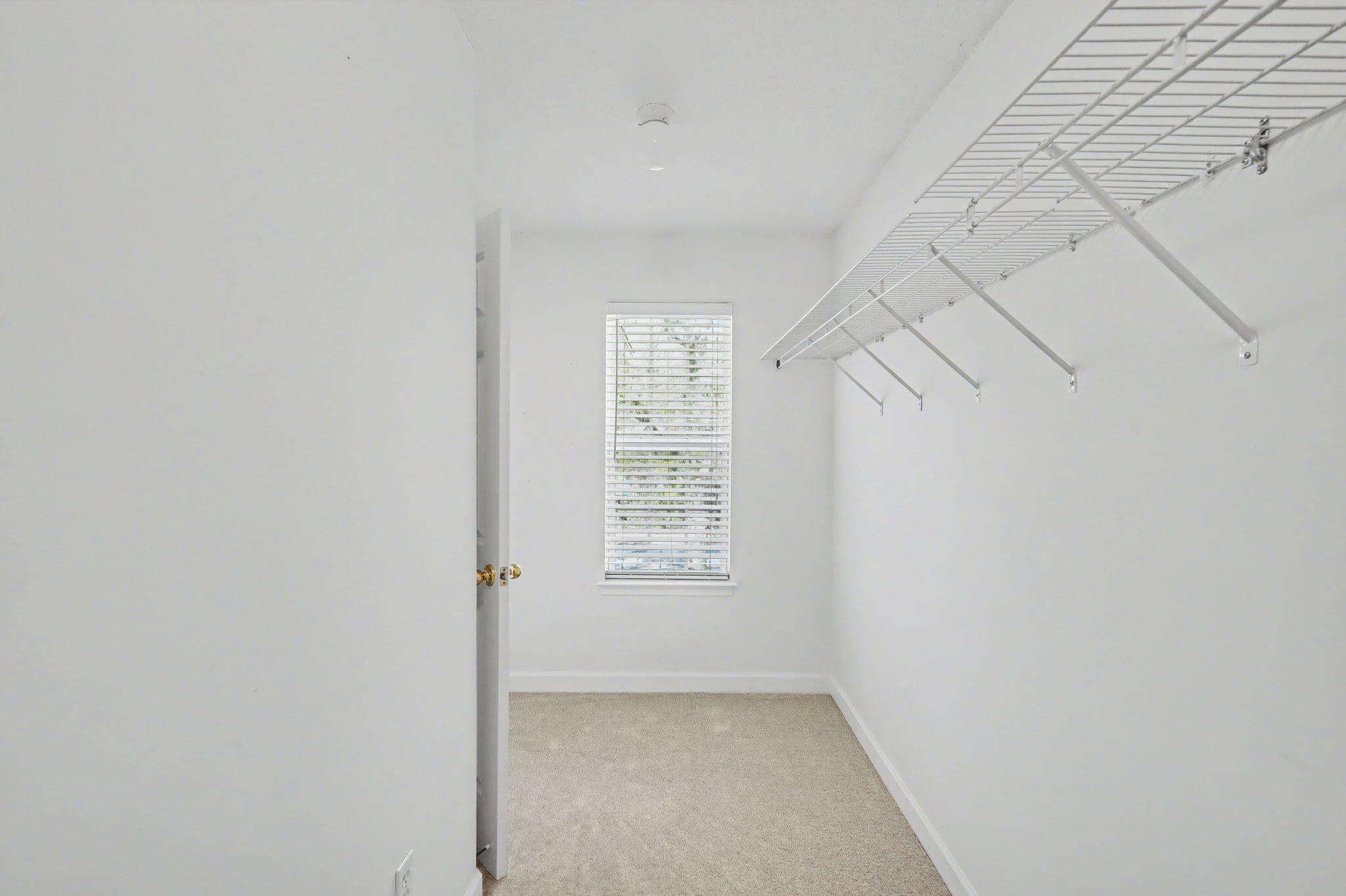 28 3rd Street Shalimar, FL 32579 - Photo 20 of 31 a view of an empty room with a window