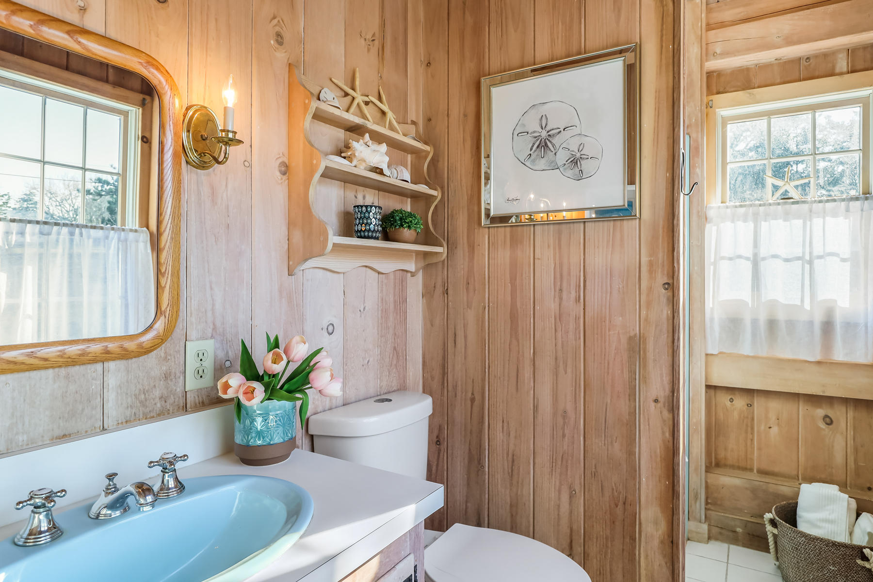 100 Lawton Road Eastham, MA 02642 - Photo 20 of 62 a bath room with a toilet and a bath tub