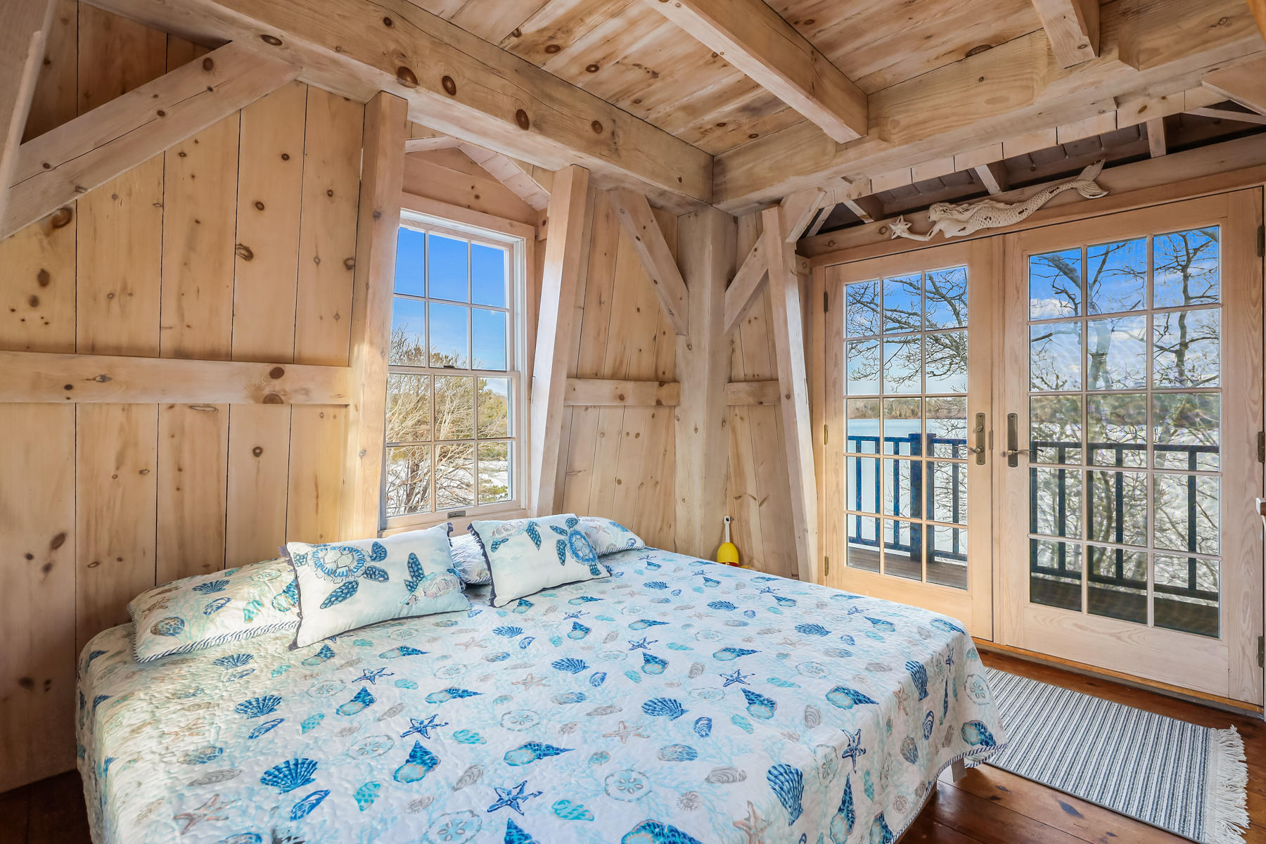100 Lawton Road Eastham, MA 02642 - Photo 45 of 62 a bedroom with a bed and a window