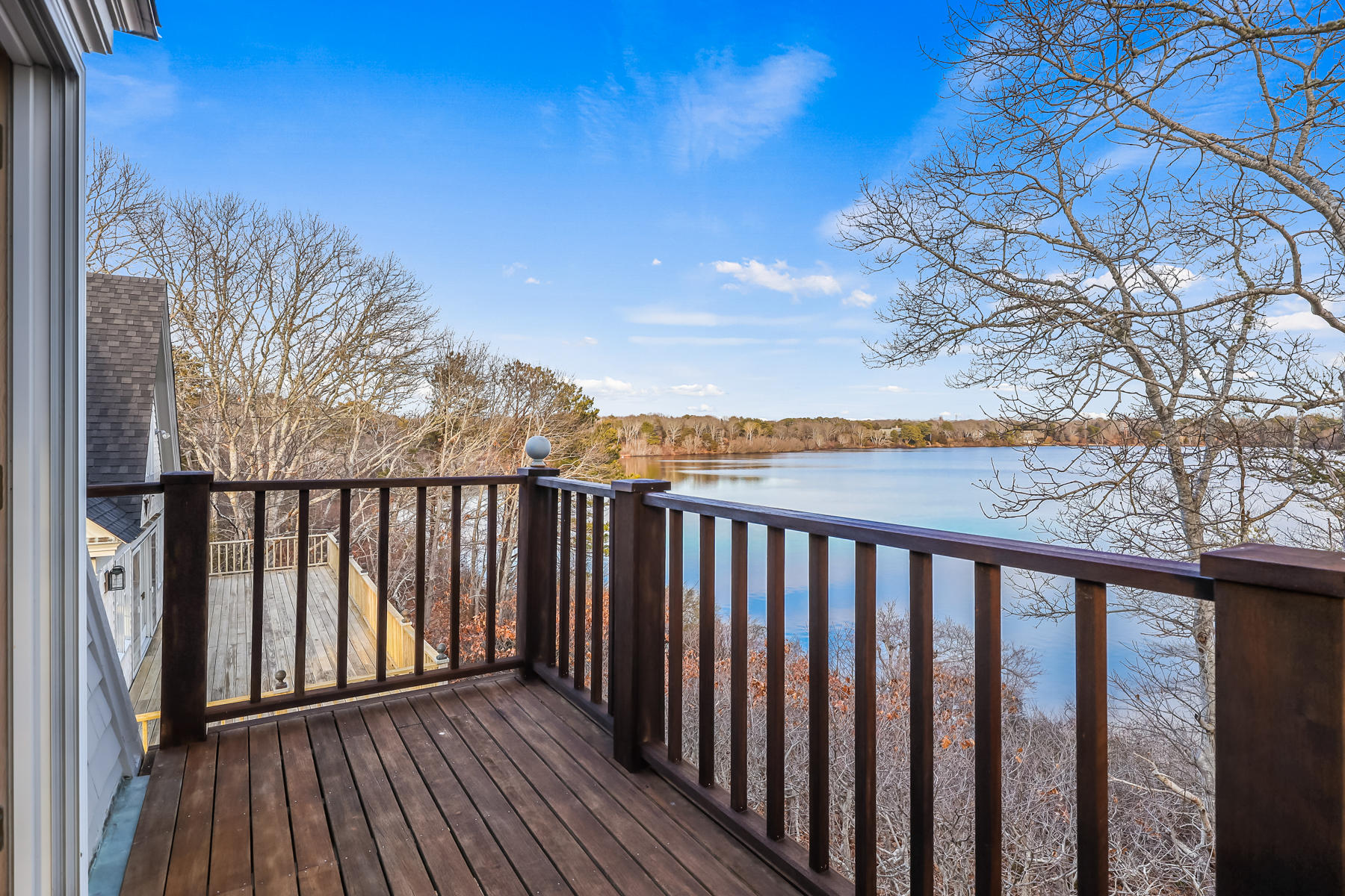 100 Lawton Road Eastham, MA 02642 - Photo 48 of 62 a balcony with wooden floor and fence