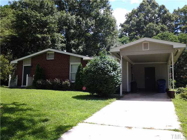 829 Friar Tuck Road Raleigh, NC 27610 - Photo 2 of 5 a front view of a house with a yard