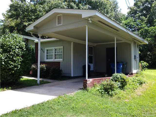 829 Friar Tuck Road Raleigh, NC 27610 - Photo 3 of 5 a front view of a house with garden