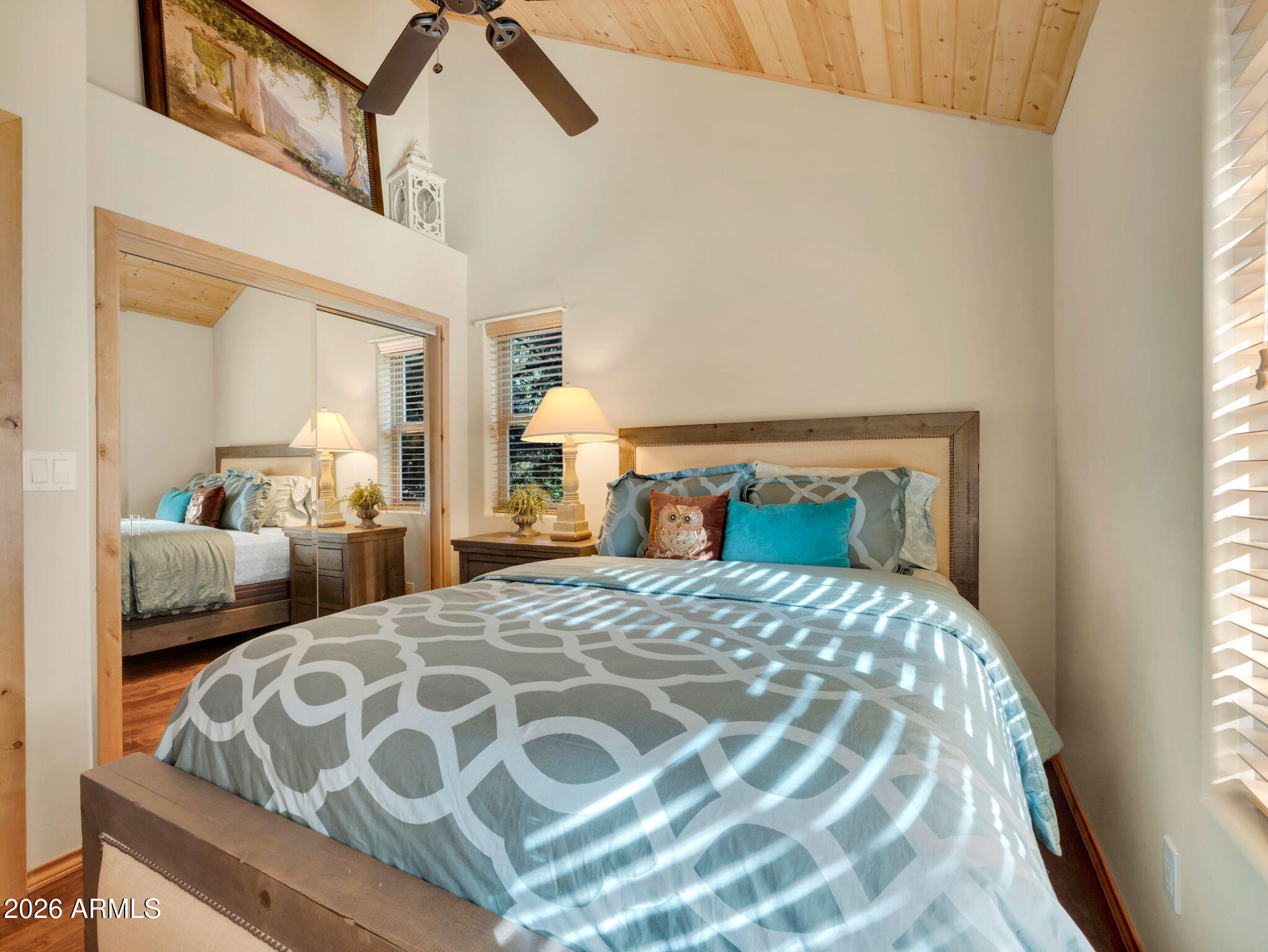 6829 Robbin Lane Pine, AZ 85544 - Photo 24 of 44 a bedroom with double bed and a window