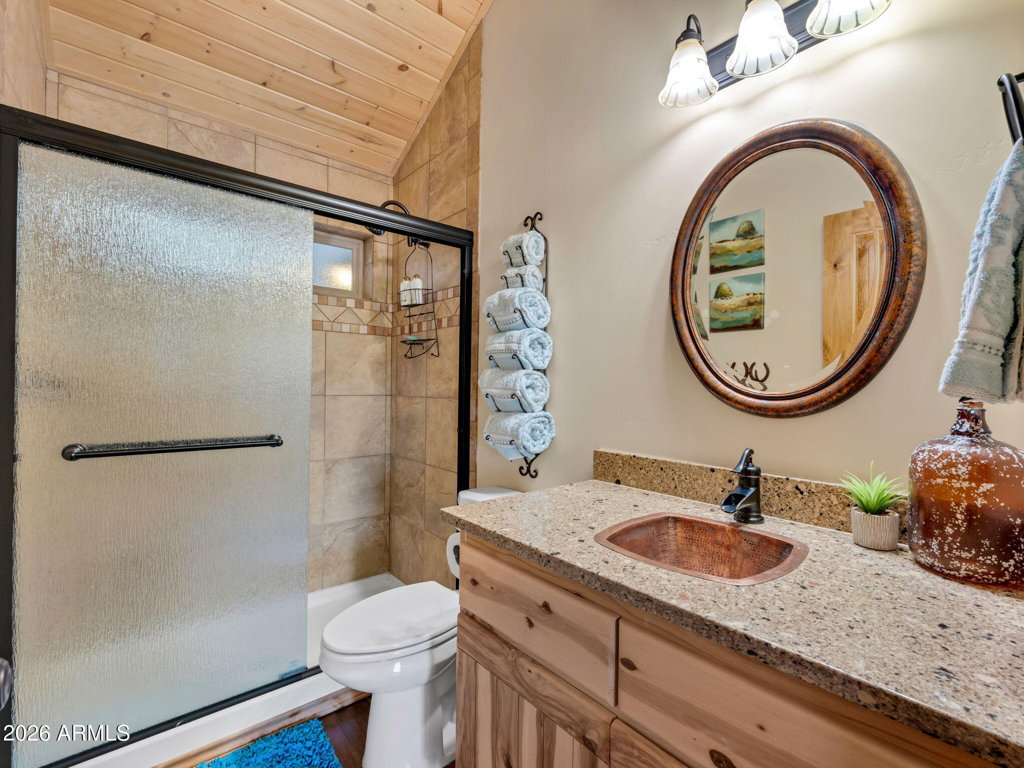 6829 Robbin Lane Pine, AZ 85544 - Photo 25 of 44 a bathroom with a sink and a mirror