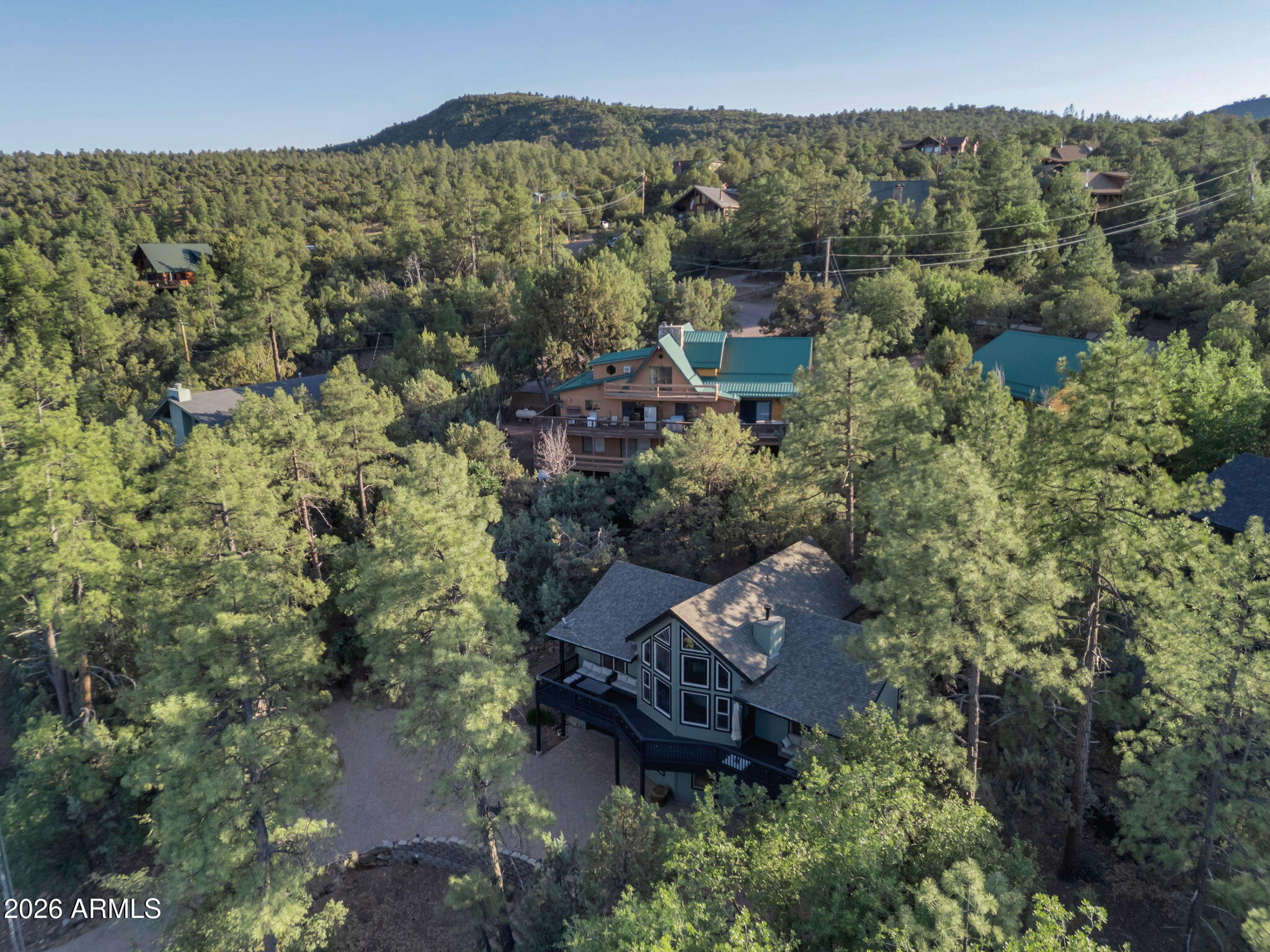 6829 Robbin Lane Pine, AZ 85544 - Photo 39 of 44 an aerial view of a house with a yard