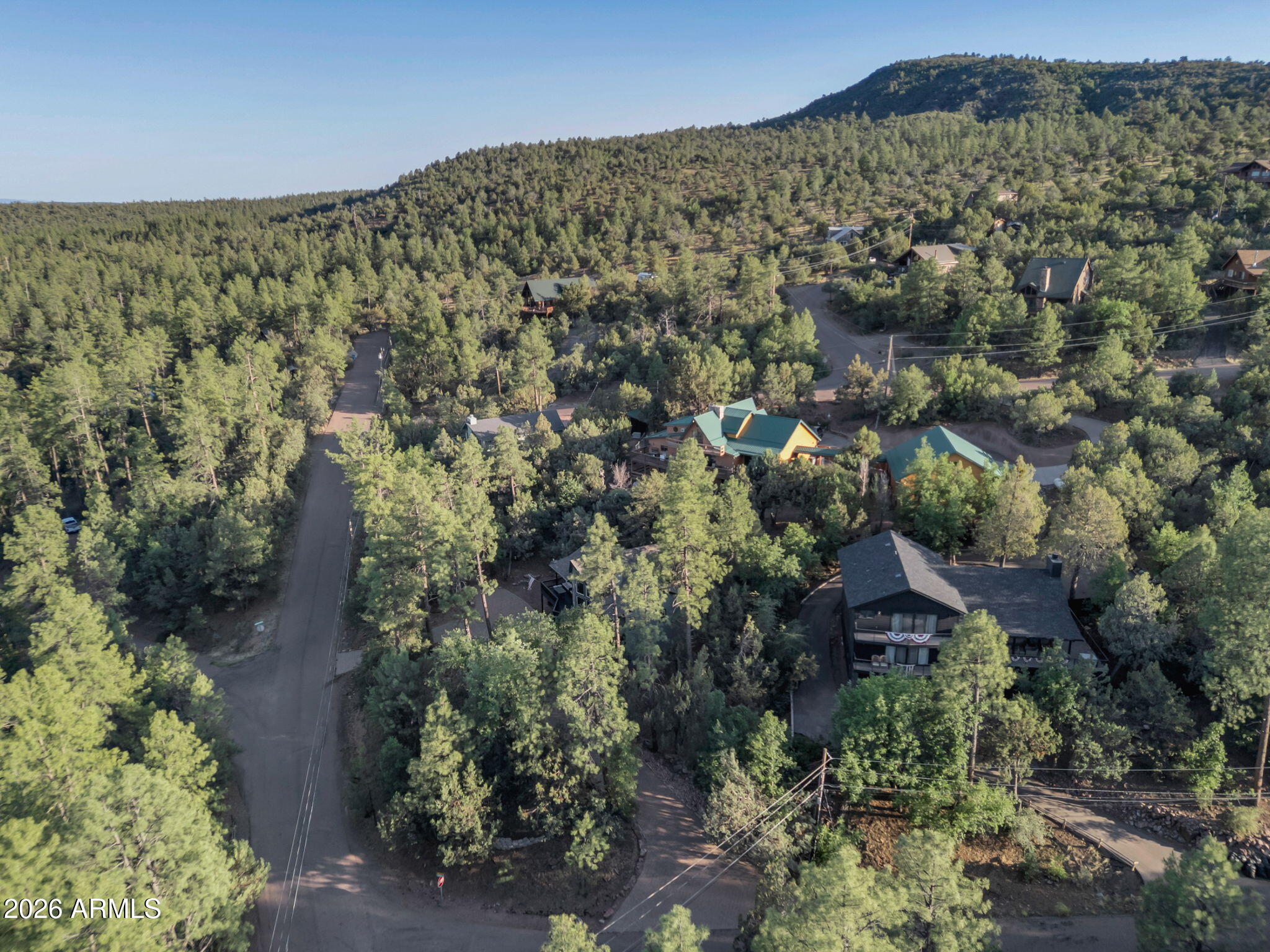 6829 Robbin Lane Pine, AZ 85544 - Photo 41 of 44 an aerial view of a house with a yard