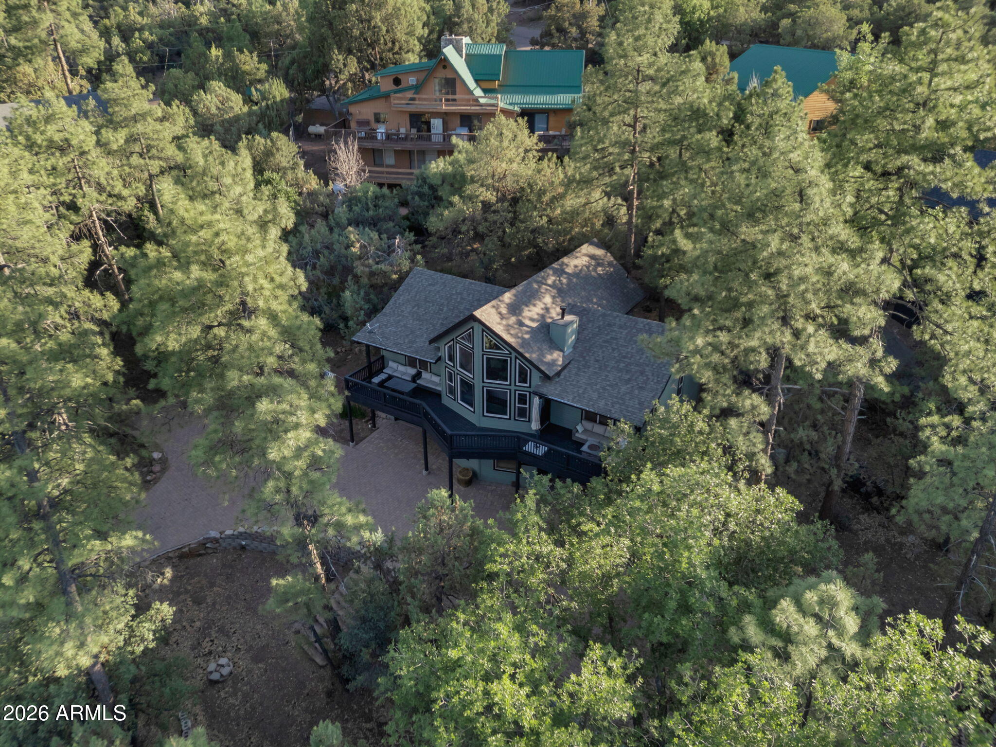 6829 Robbin Lane Pine, AZ 85544 - Photo 42 of 44 an aerial view of a house with a yard