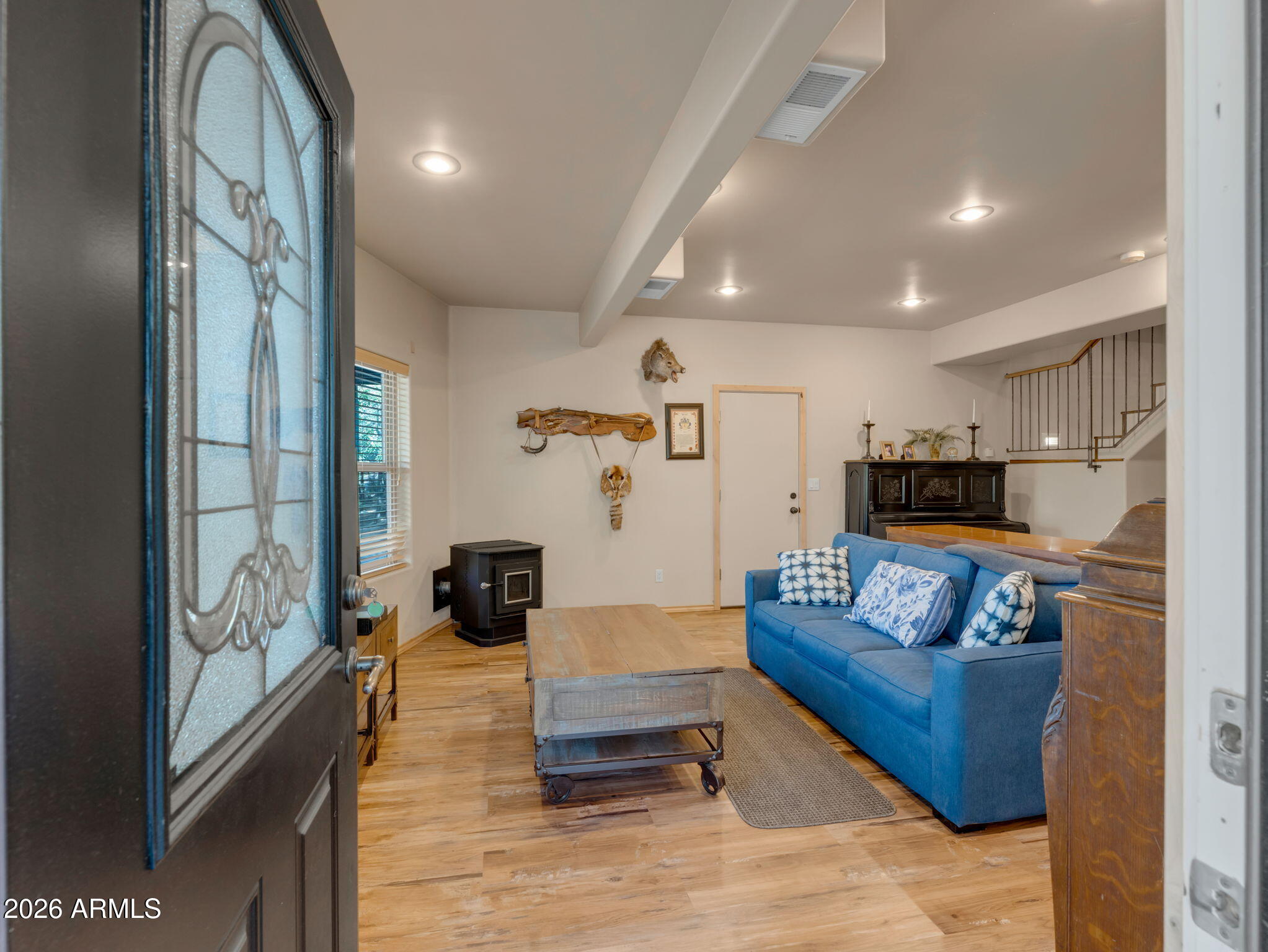 6829 Robbin Lane Pine, AZ 85544 - Photo 5 of 44 a living room with furniture and a flat screen tv