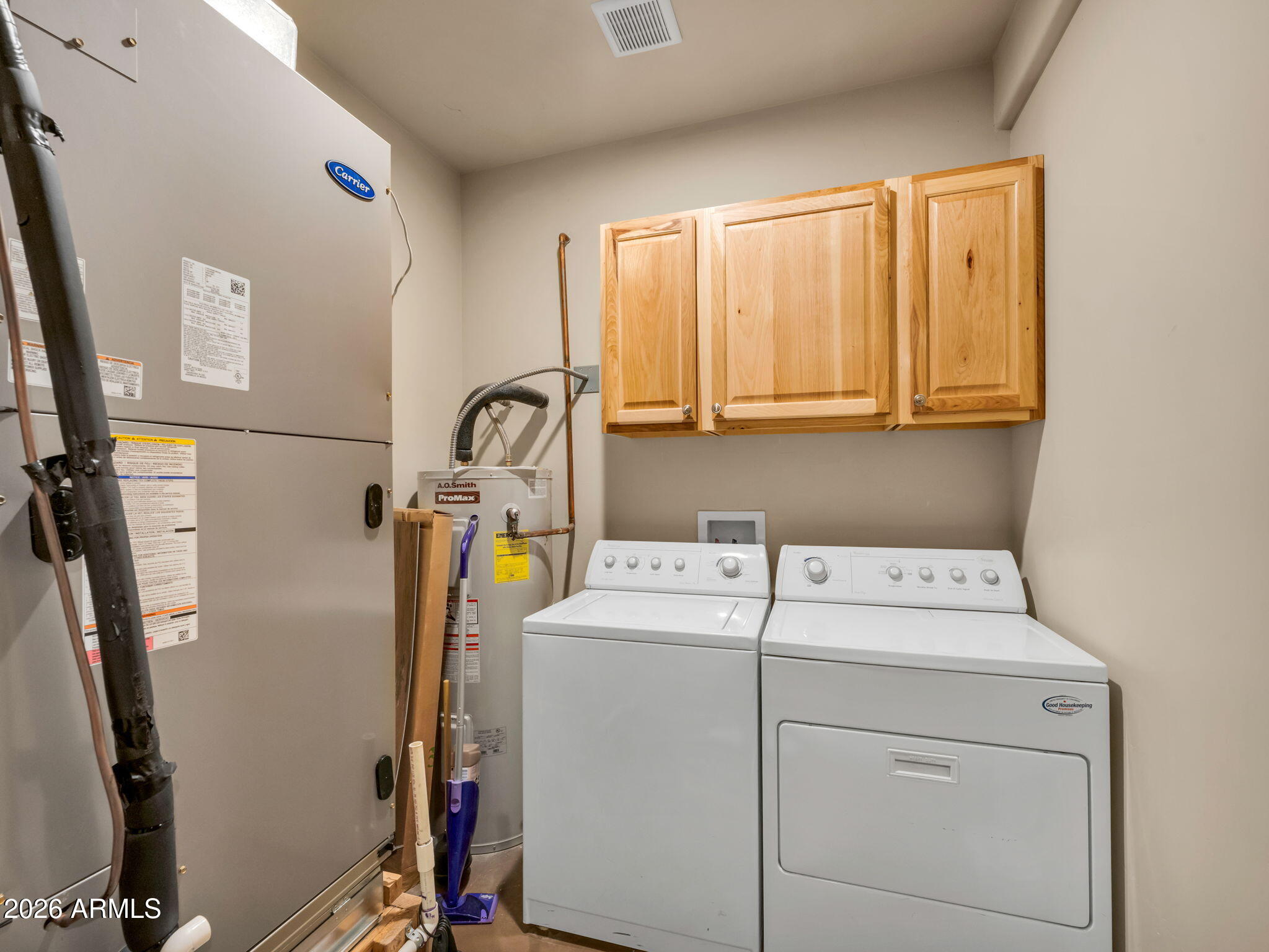6829 Robbin Lane Pine, AZ 85544 - Photo 8 of 44 a utility room with dryer and washer