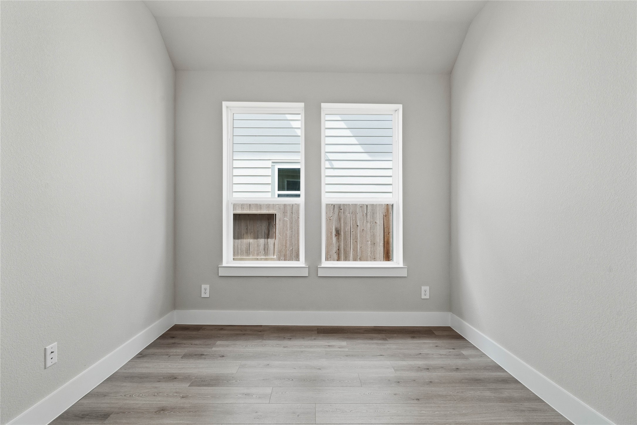 9123 Petroglyph Pt Court Porter, TX 77365 - Photo 11 of 43 The Study provides the quiet retreat necessary for a productive home office, eliminating the daily commute and maximizing work-from-home efficiency. It features French doors, neutral toned walls, and large windows.