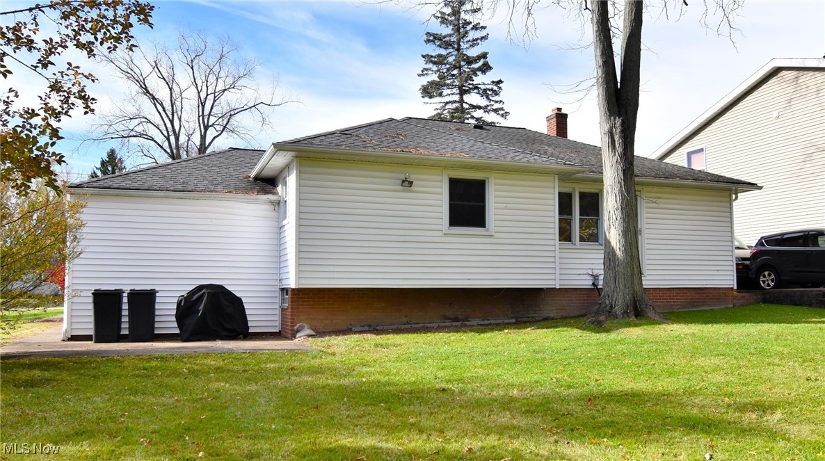 38535 Aurora Road Solon, OH 44139 - Photo 25 of 26 Back of property featuring a yard