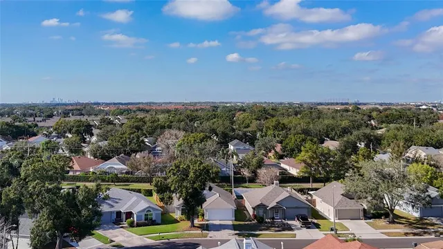 an aerial view of a house having yard