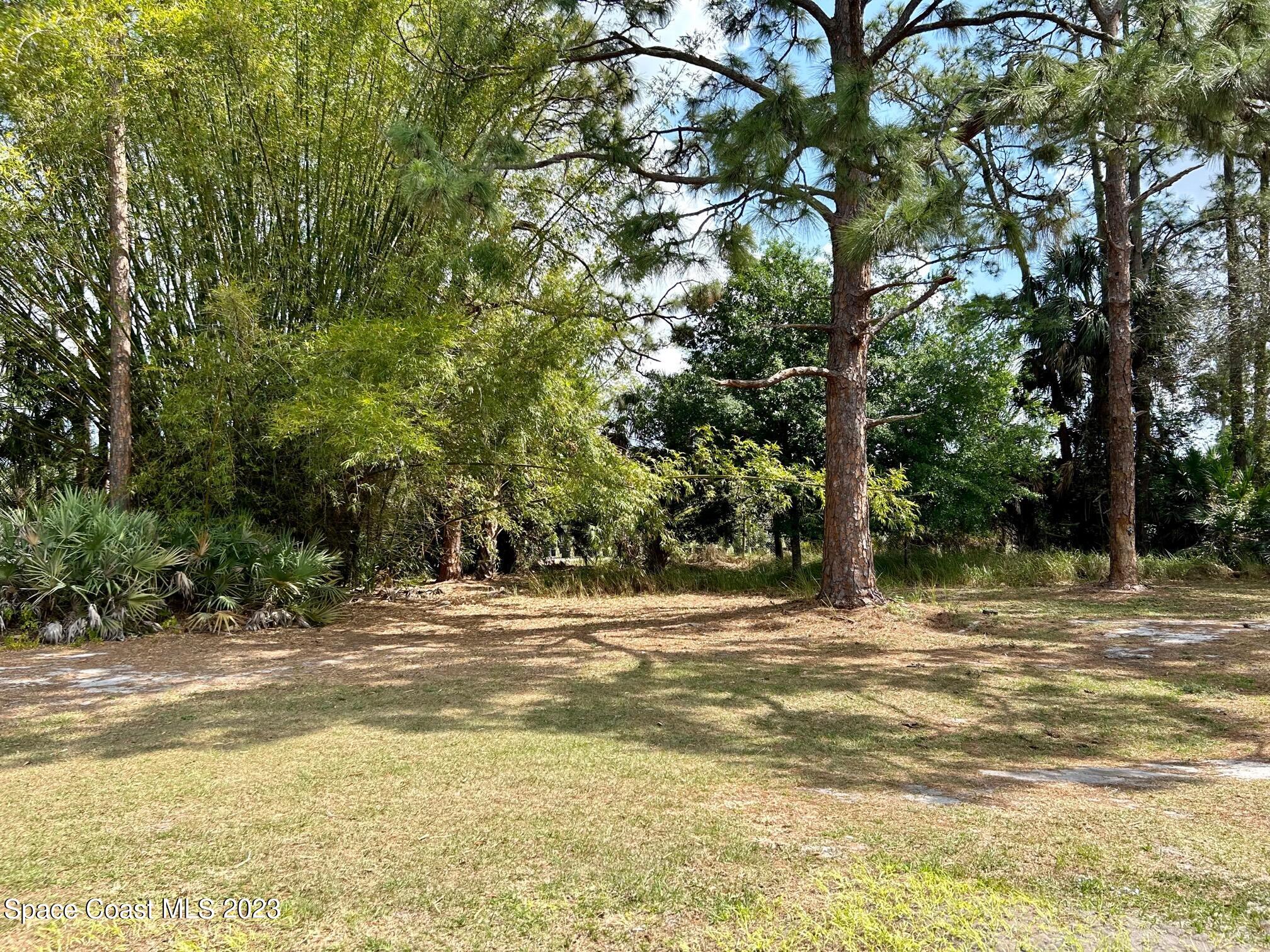 1639 Emmaus Road Northwest Palm Bay, FL 32907 - Photo 35 of 40 a house view with a outdoor space