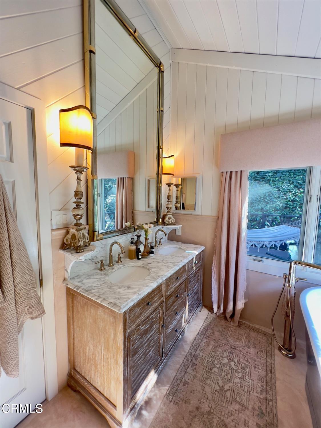 2460 Valley Meadow Drive Oak View, CA 93022 - Photo 25 of 49 a bathroom with a granite countertop sink and a mirror