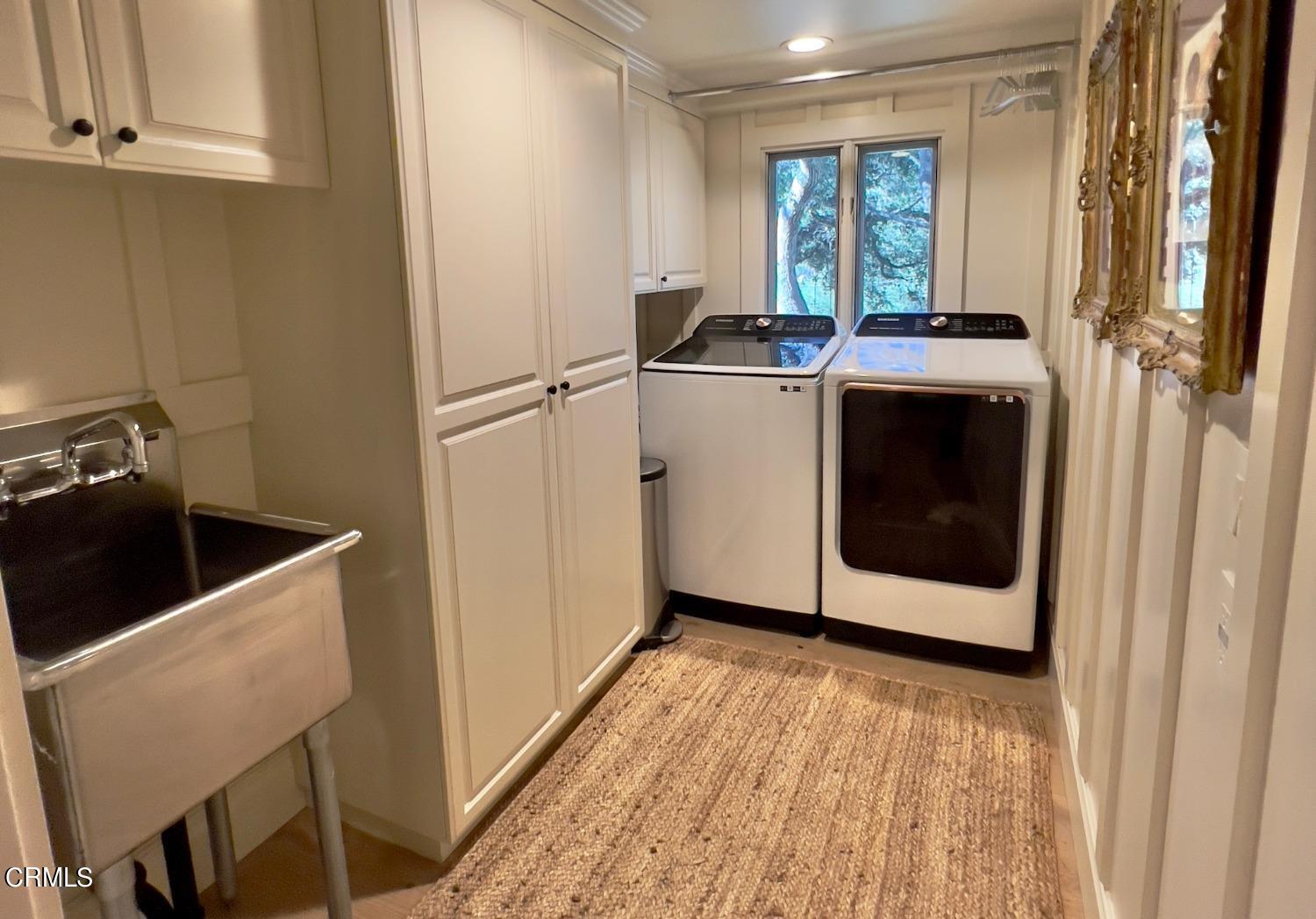2460 Valley Meadow Drive Oak View, CA 93022 - Photo 33 of 49 a utility room with dryer and washer