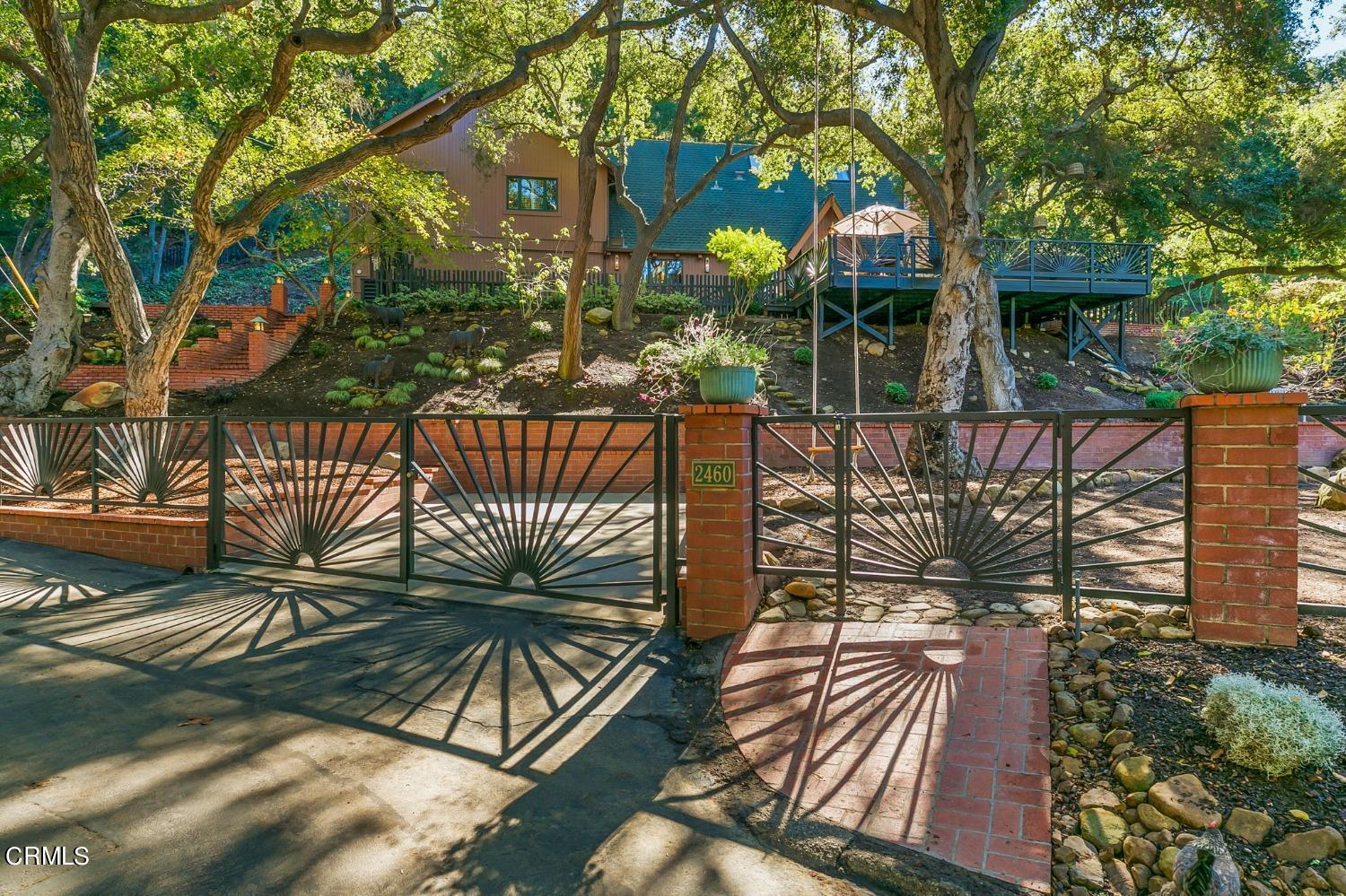2460 Valley Meadow Drive Oak View, CA 93022 - Photo 35 of 49 a view of a house with backyard and sitting area