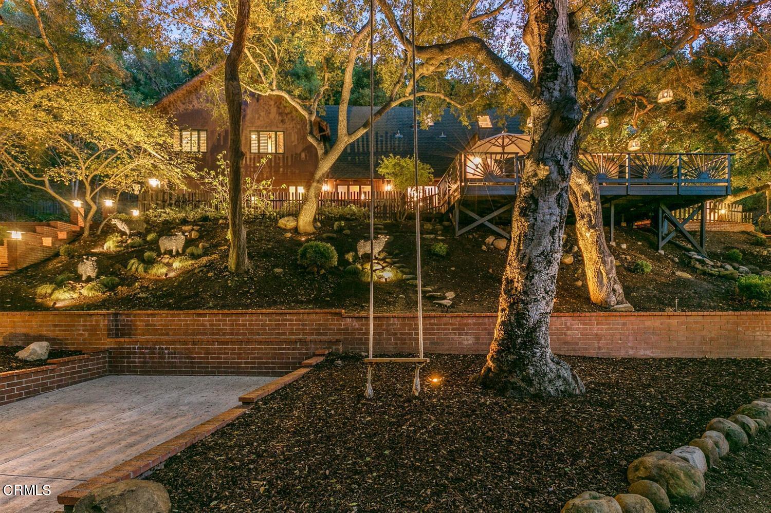 2460 Valley Meadow Drive Oak View, CA 93022 - Photo 36 of 49 a backyard of a house with lots of green space