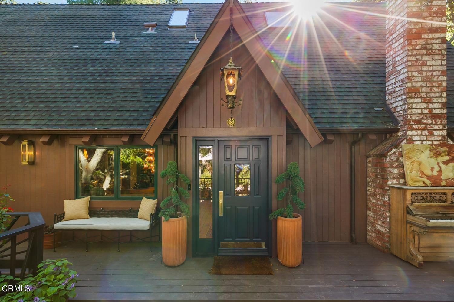 2460 Valley Meadow Drive Oak View, CA 93022 - Photo 38 of 49 a front view of a house with outdoor seating