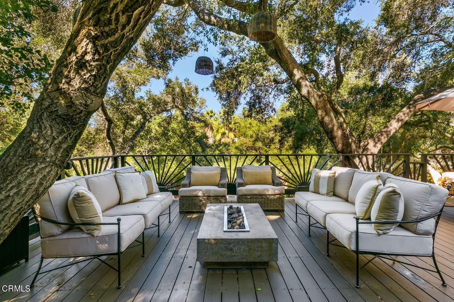 2460 Valley Meadow Drive Oak View, CA 93022 - Photo 39 of 49 a balcony with wooden floor and outdoor seating